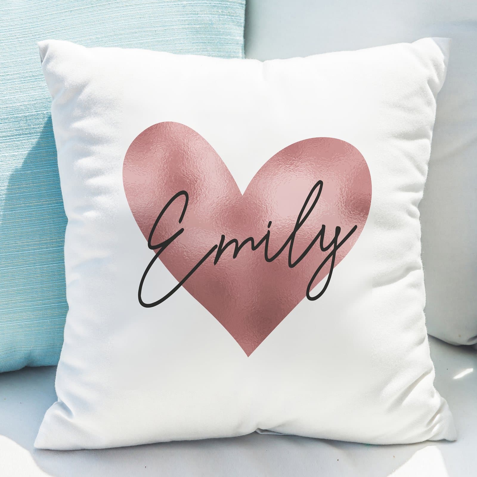Rose gold heart cushion personalised with a name