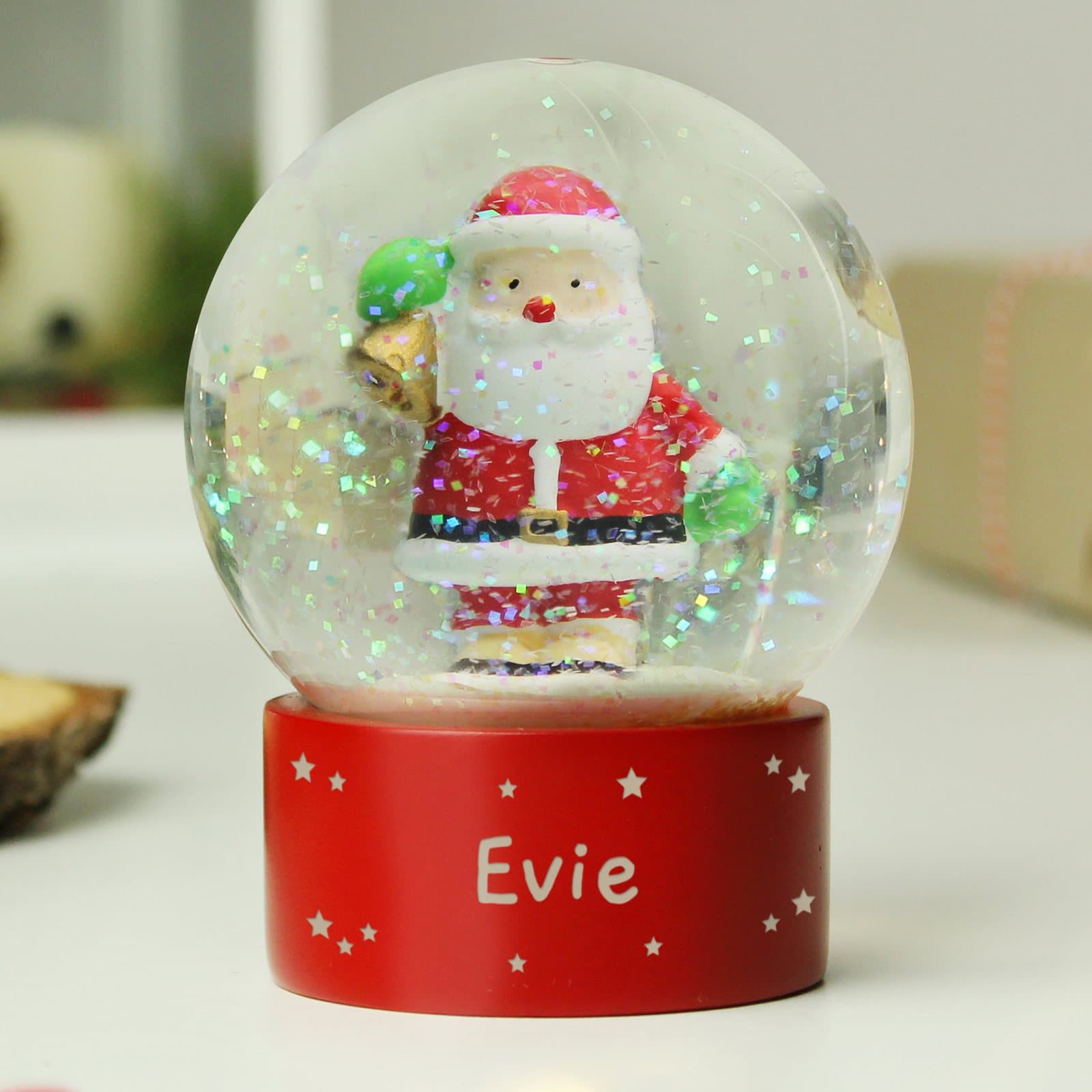 Santa snow globe filled with glitter and a personalised name