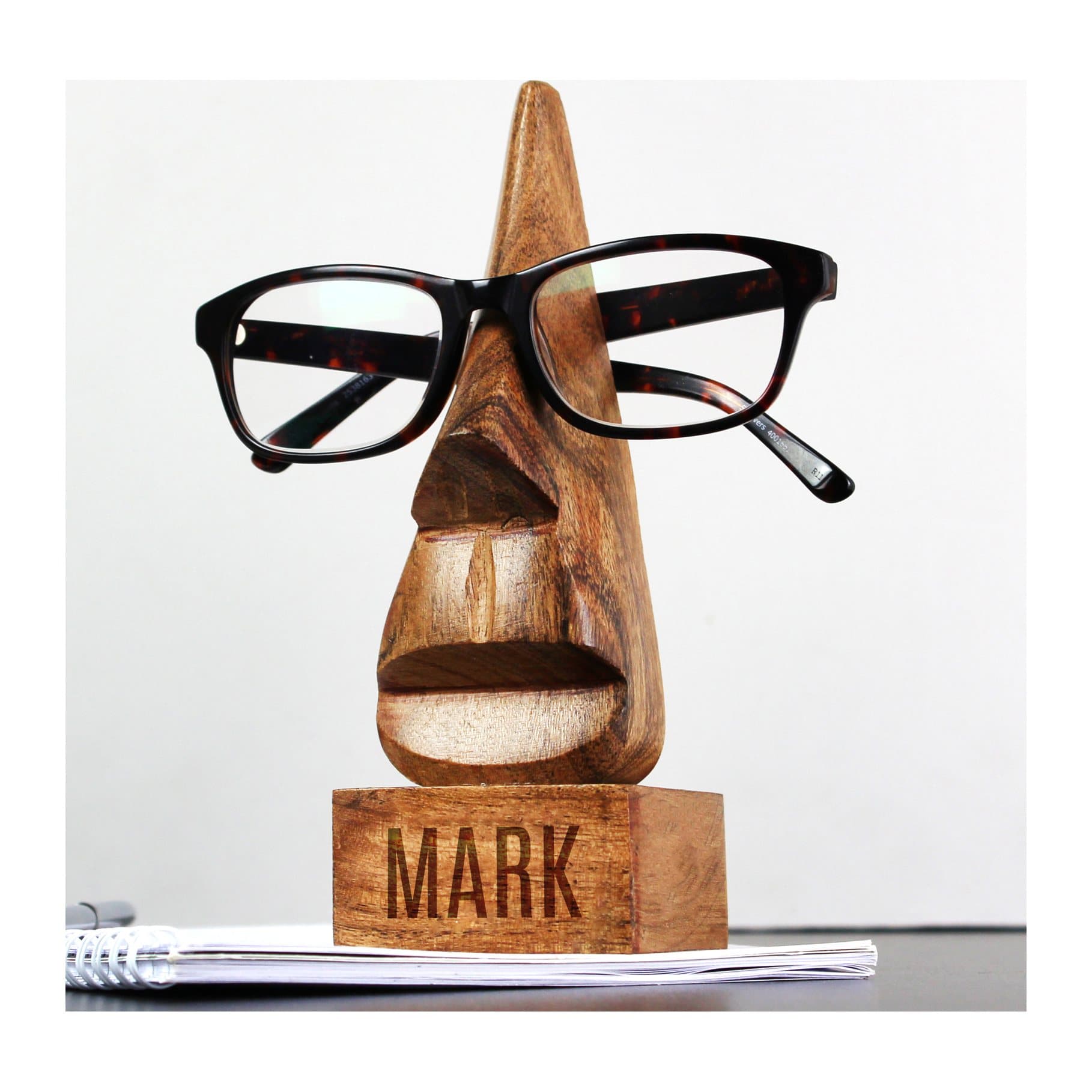 Personalised wooden nose-shaped glasses holder