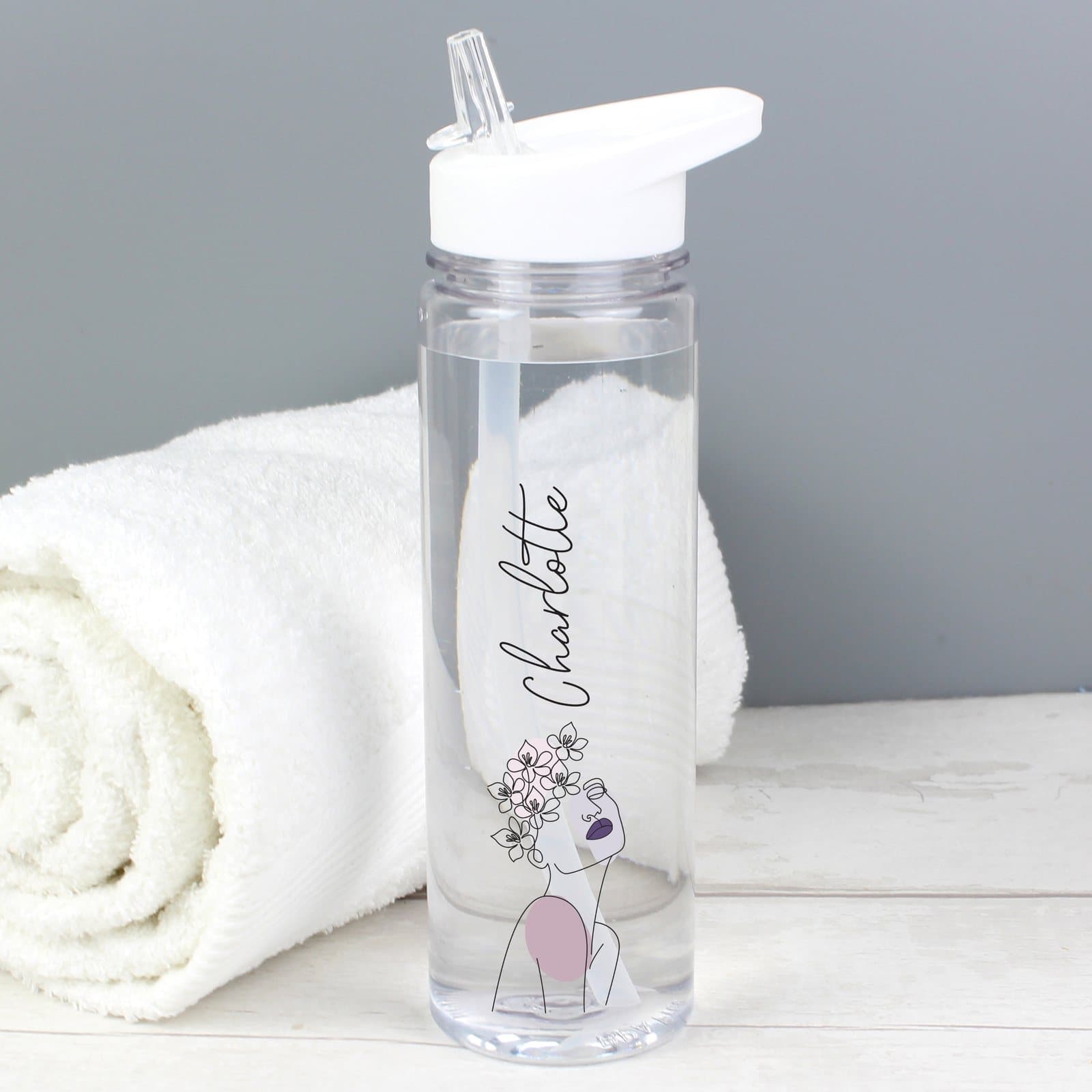 Water bottle with a fine line art design and a name above it