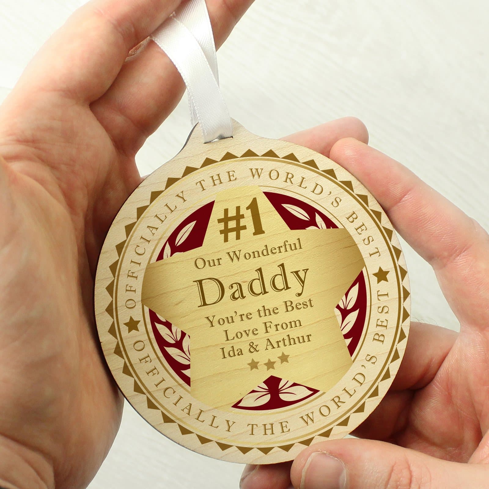 Round wooden number 1 medal with ribbon