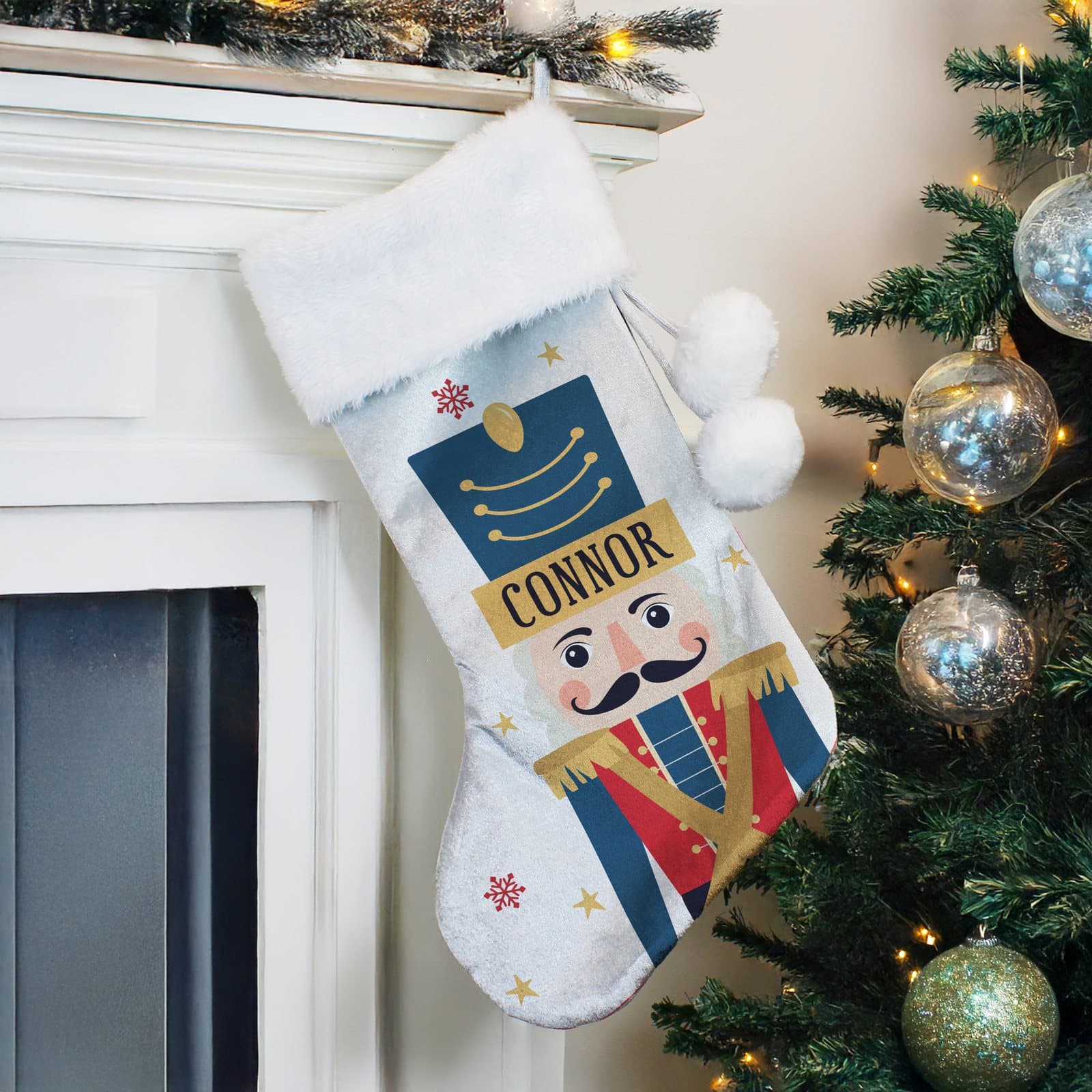 Velvet nutcracker Christmas stocking with a plush white cuff