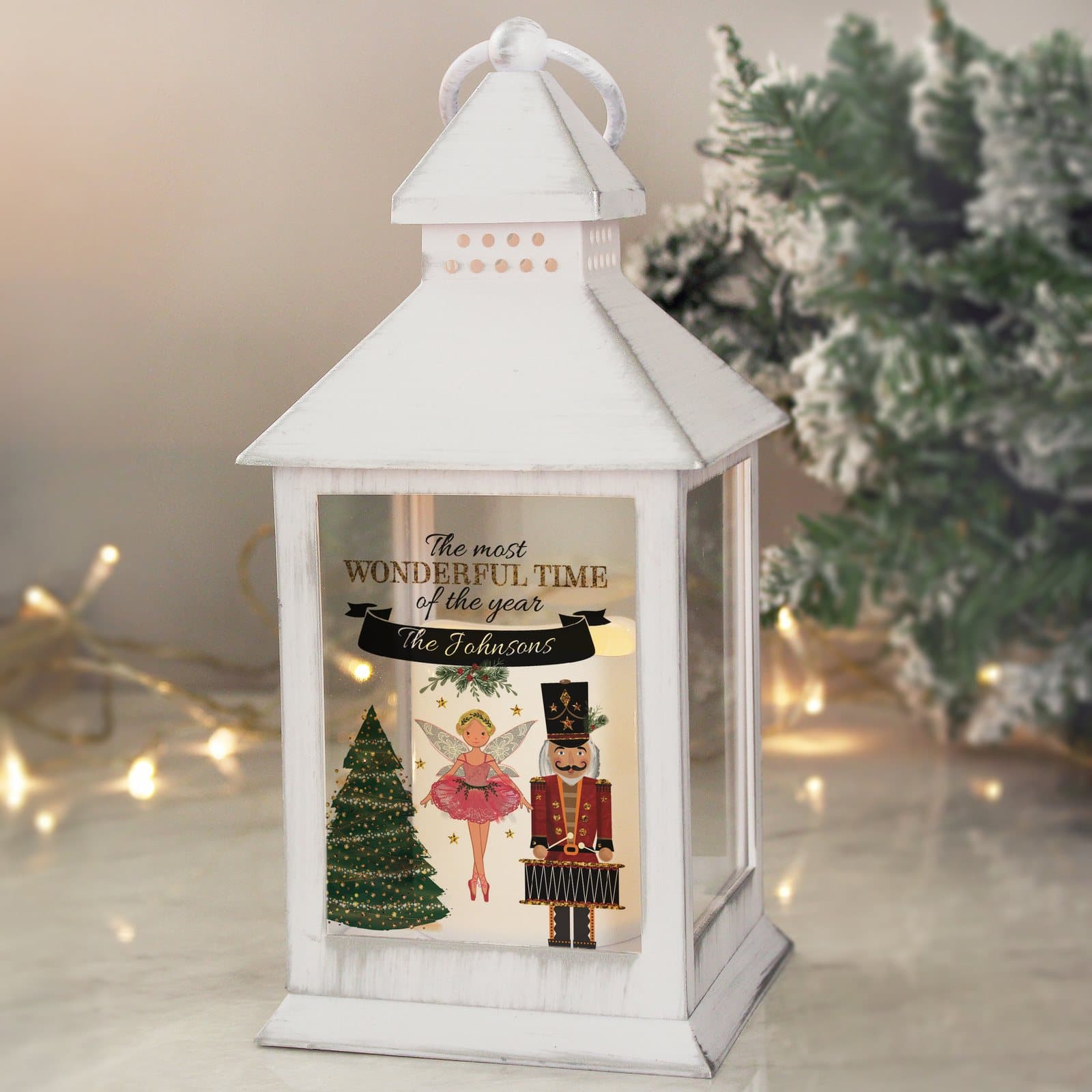 White nutcracker Christmas lantern with a hoop and a flickering flame effect