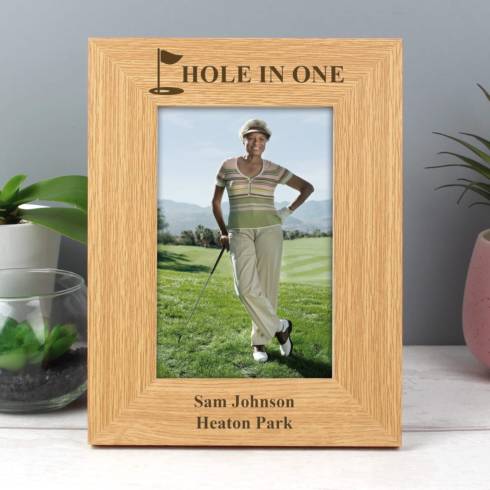 Oak finish golf photo frame with a line above and two lines below the photo