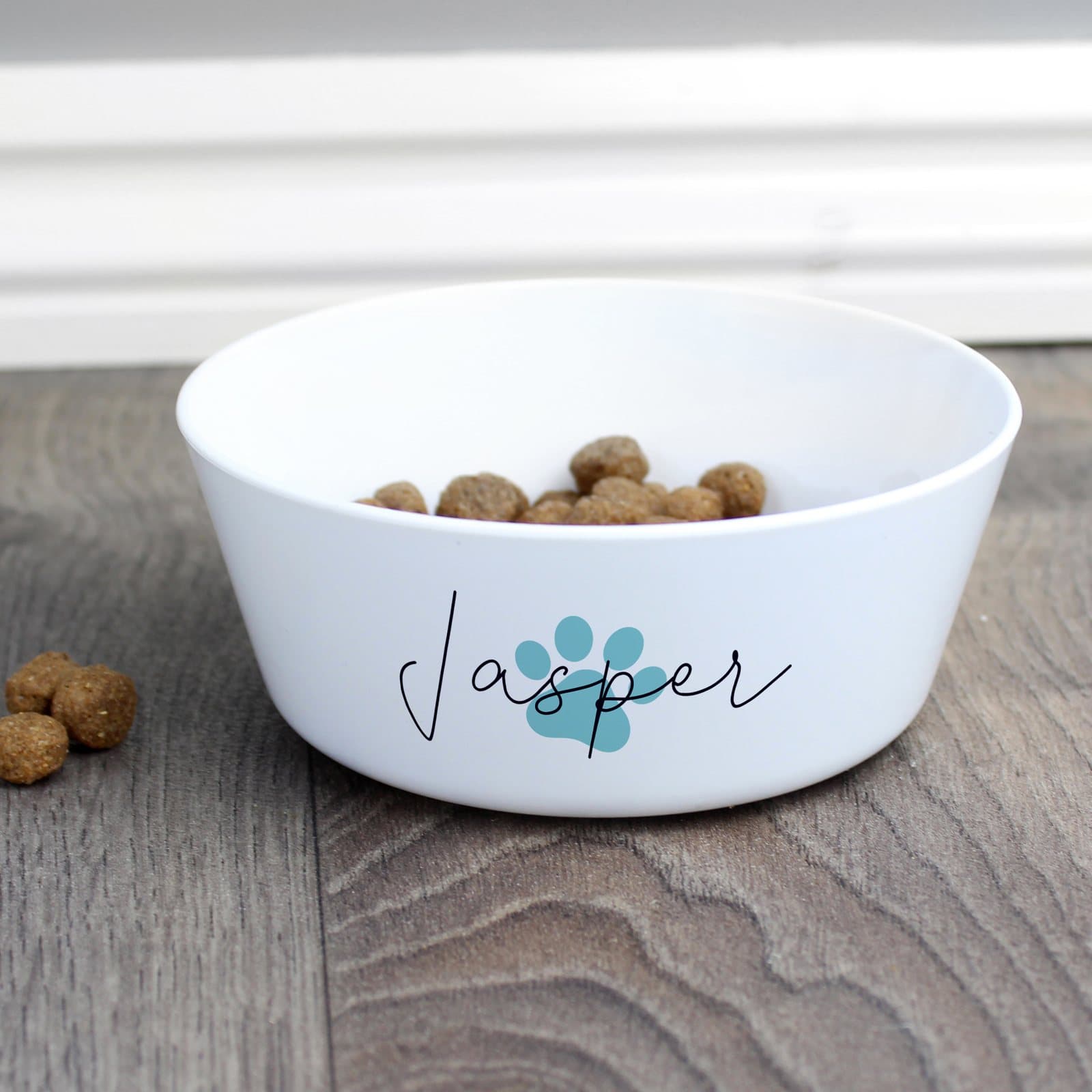 Plastic pawprint cat bowl with a personalised name