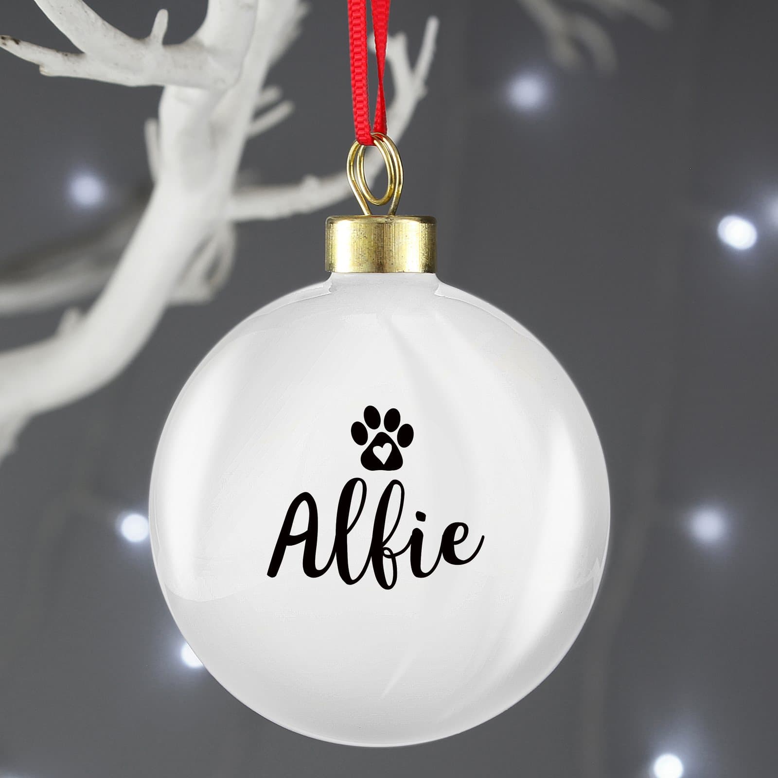 Personalised pet bauble with a ribbon for hanging on the Christmas tree