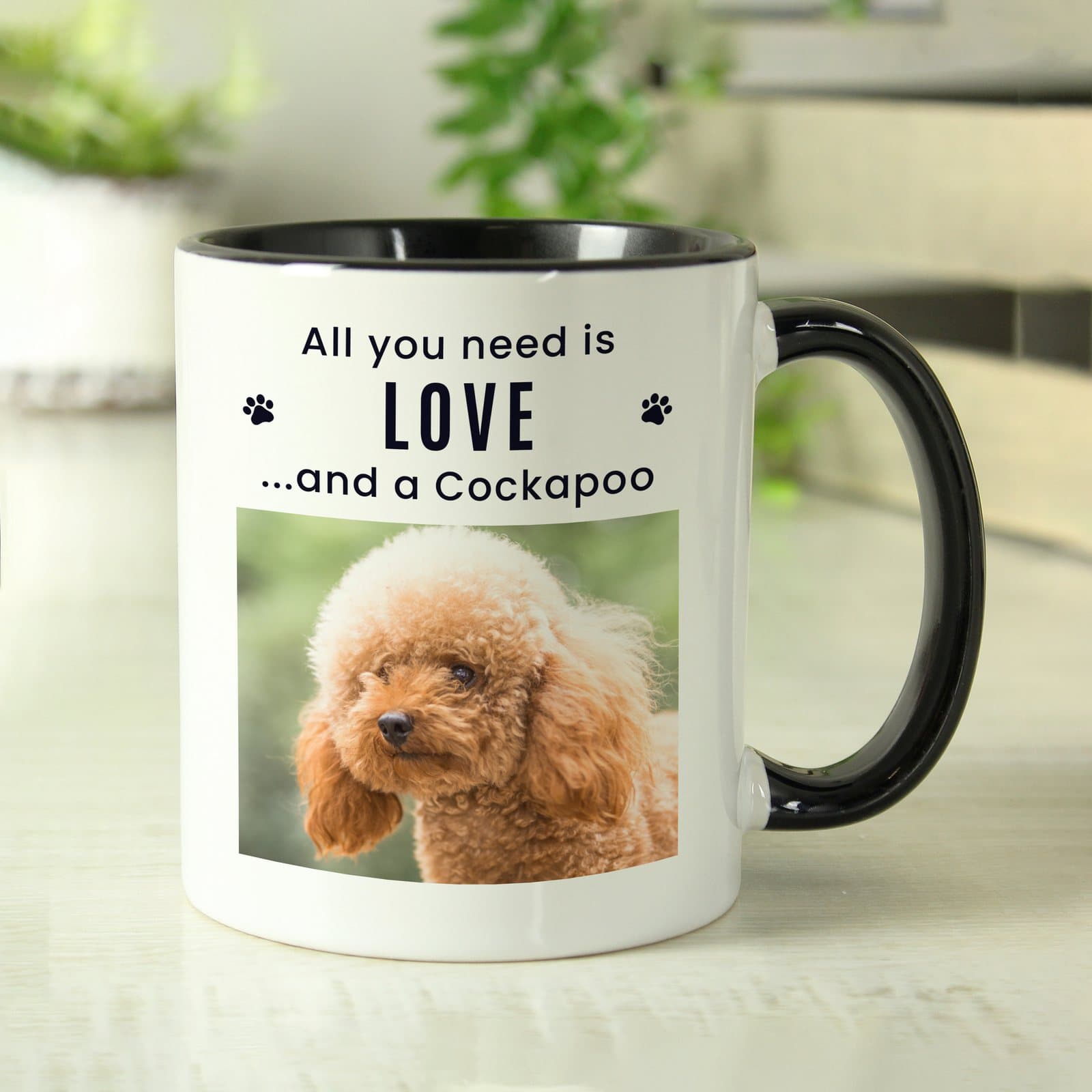 Ceramic mug with a black handle and a pet photo