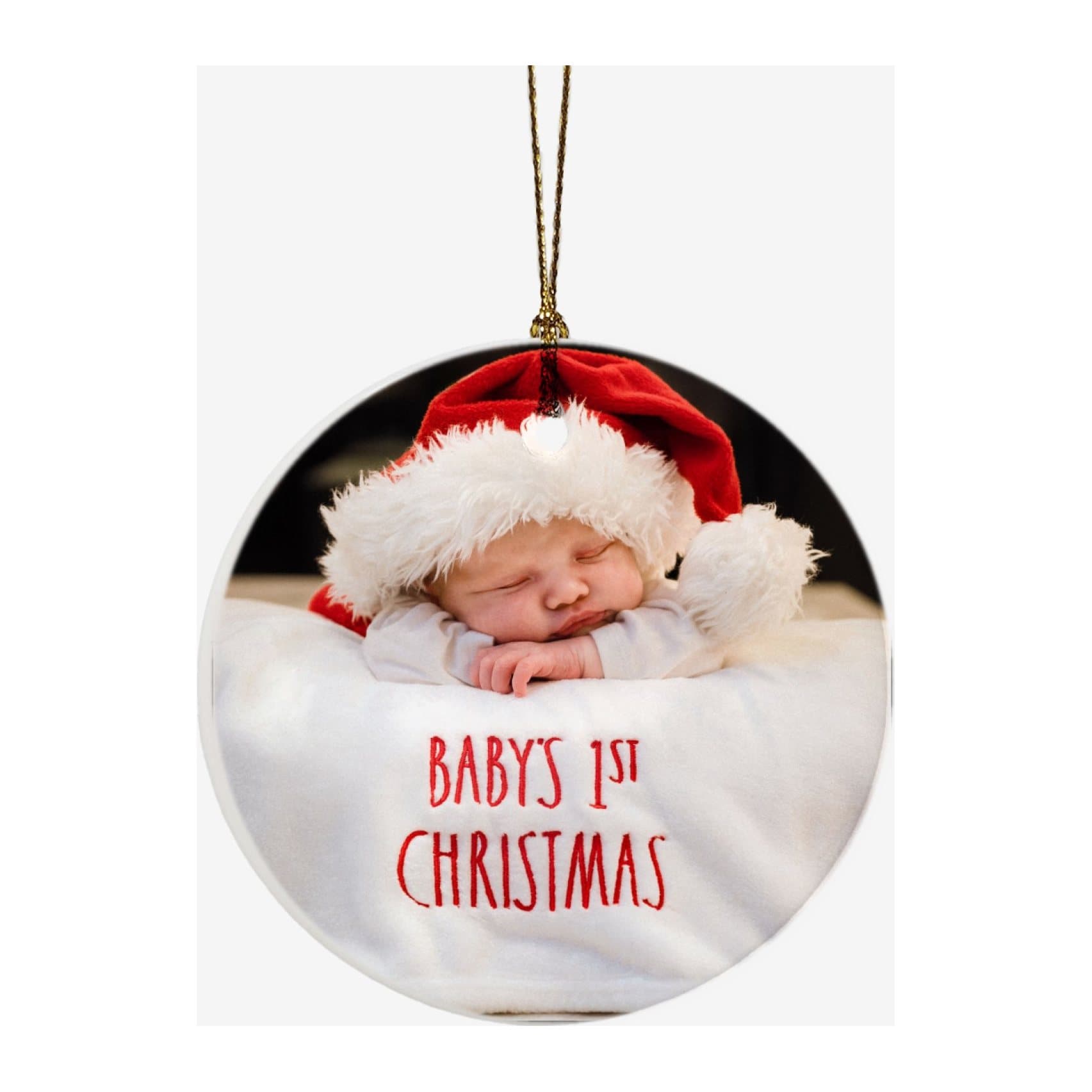 Round white ceramic bauble printed with a sleeping baby in a Santa hat