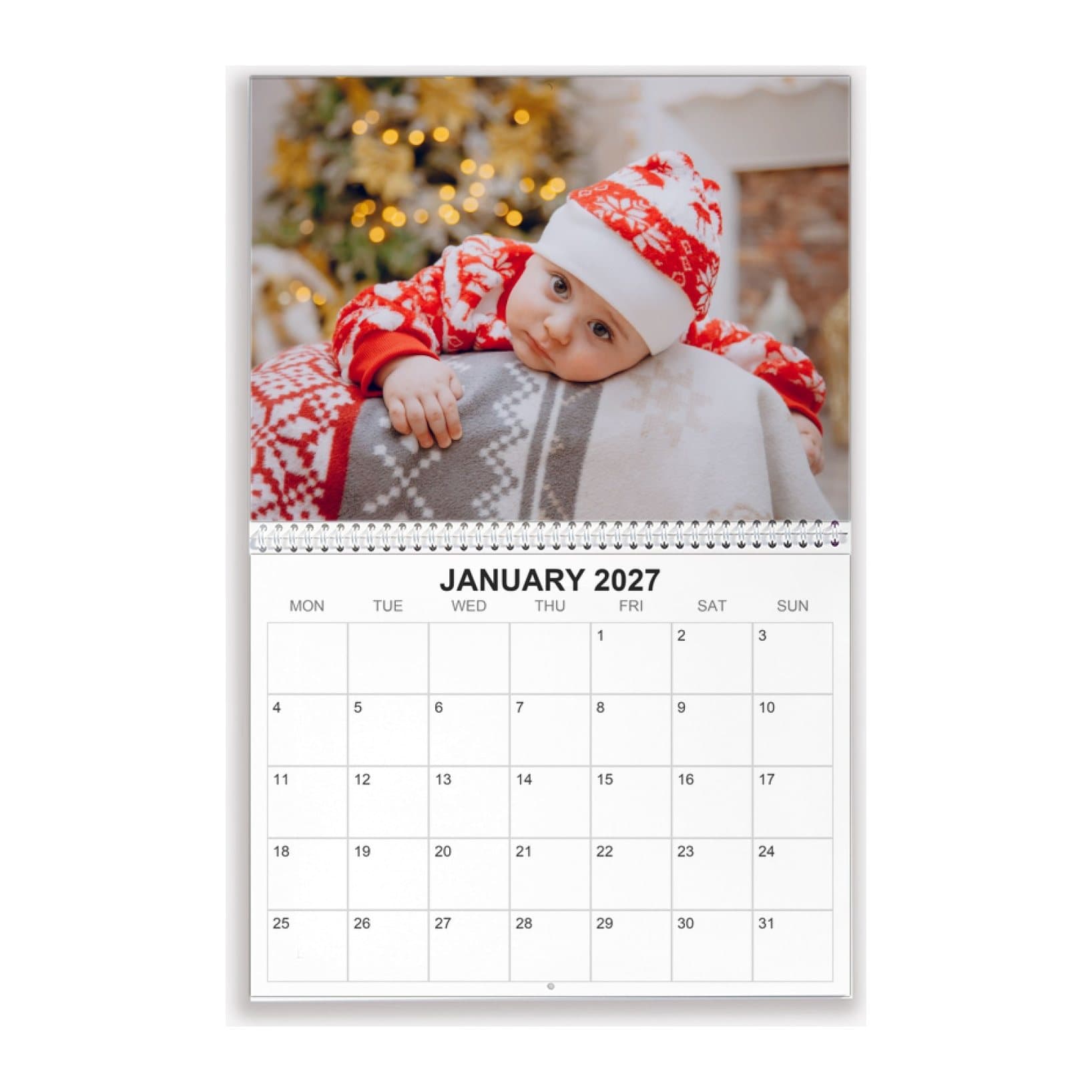 Wall calendar open on January 2027 with a baby photo above the dates