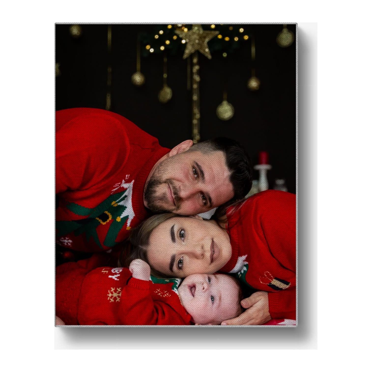 Stretched canvas printed with a family in red Christmas jumpers
