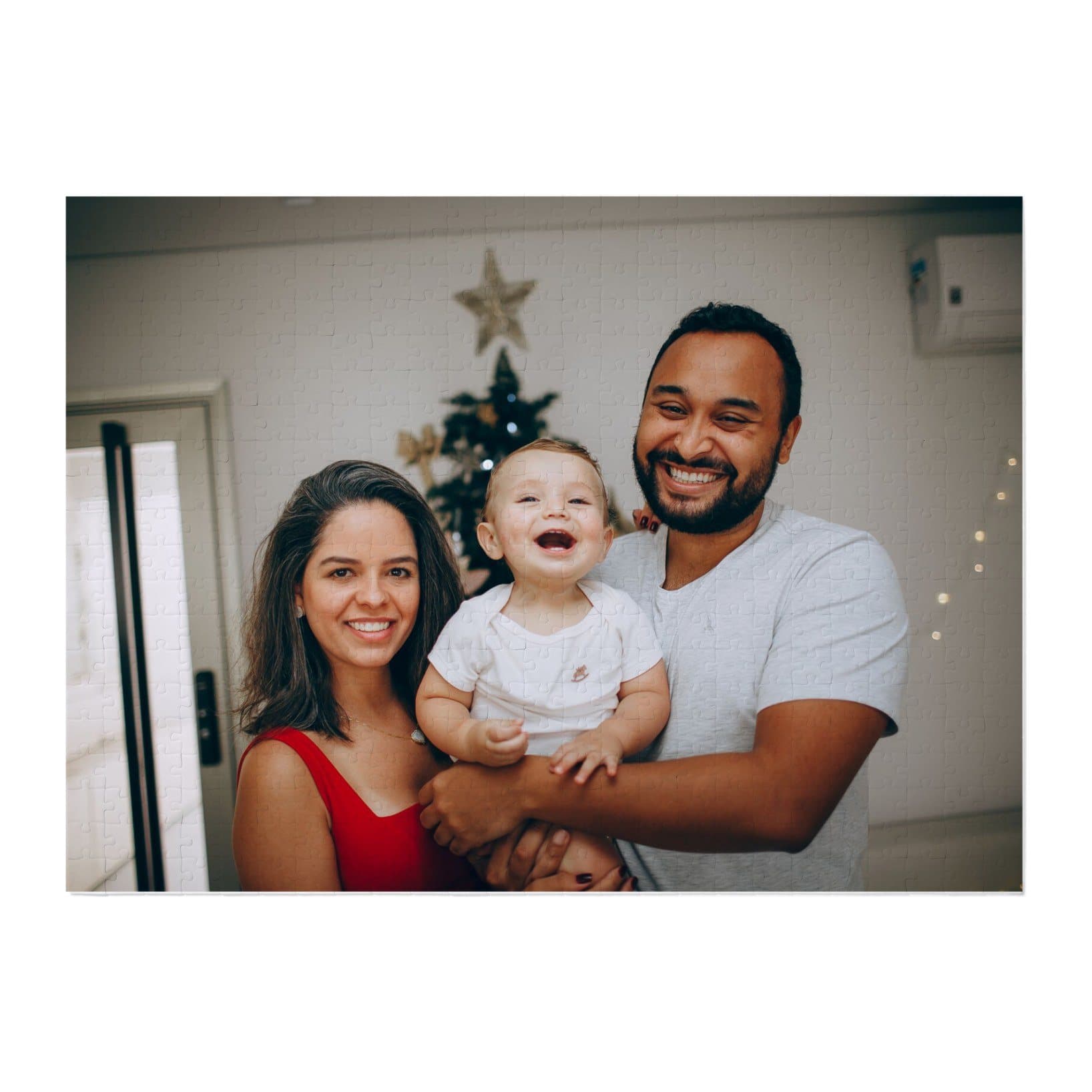 Jigsaw puzzle printed with a family photo taken by a Christmas tree