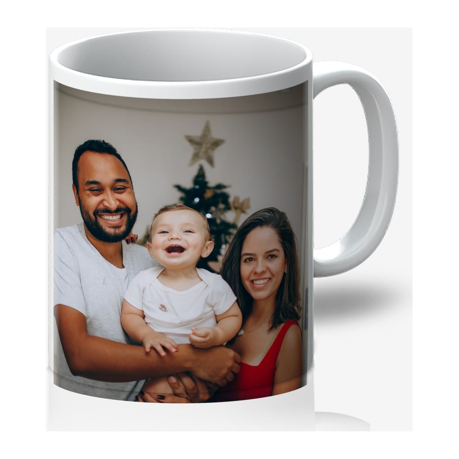 White mug printed with a photo of a family by a Christmas tree