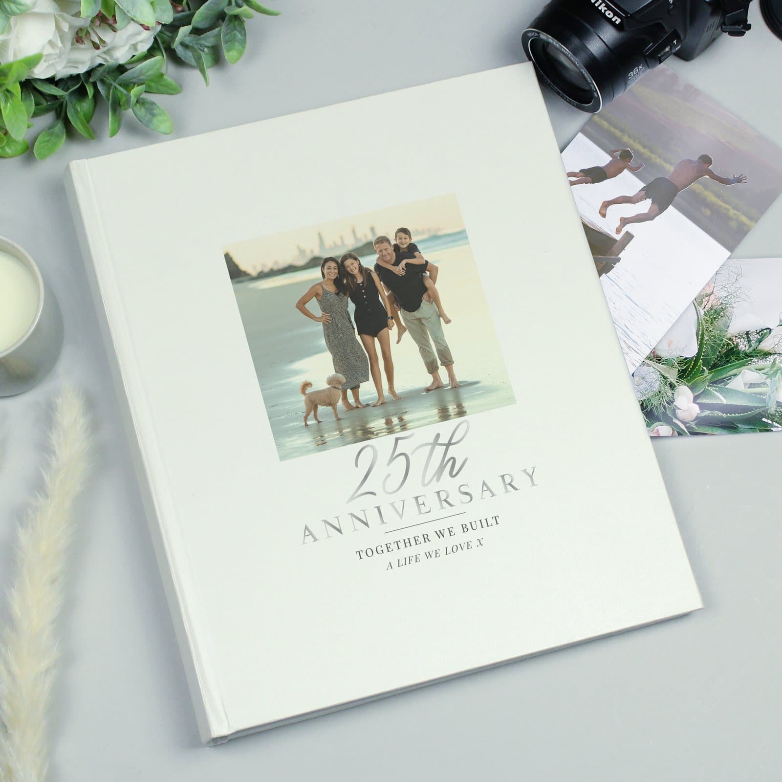 25th anniversary photo album with a photo on the cover