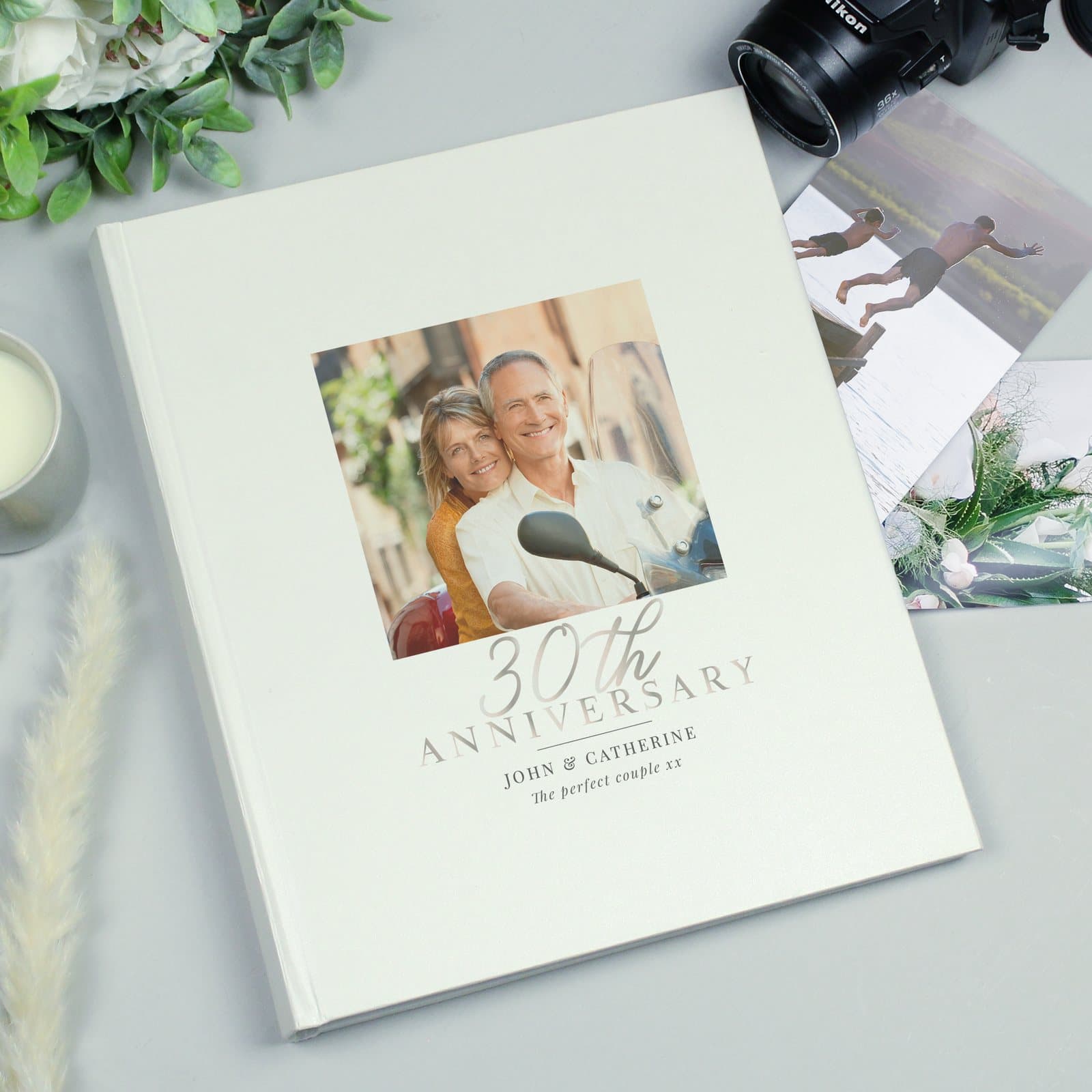 30th anniversary photo album with a photo on the cover