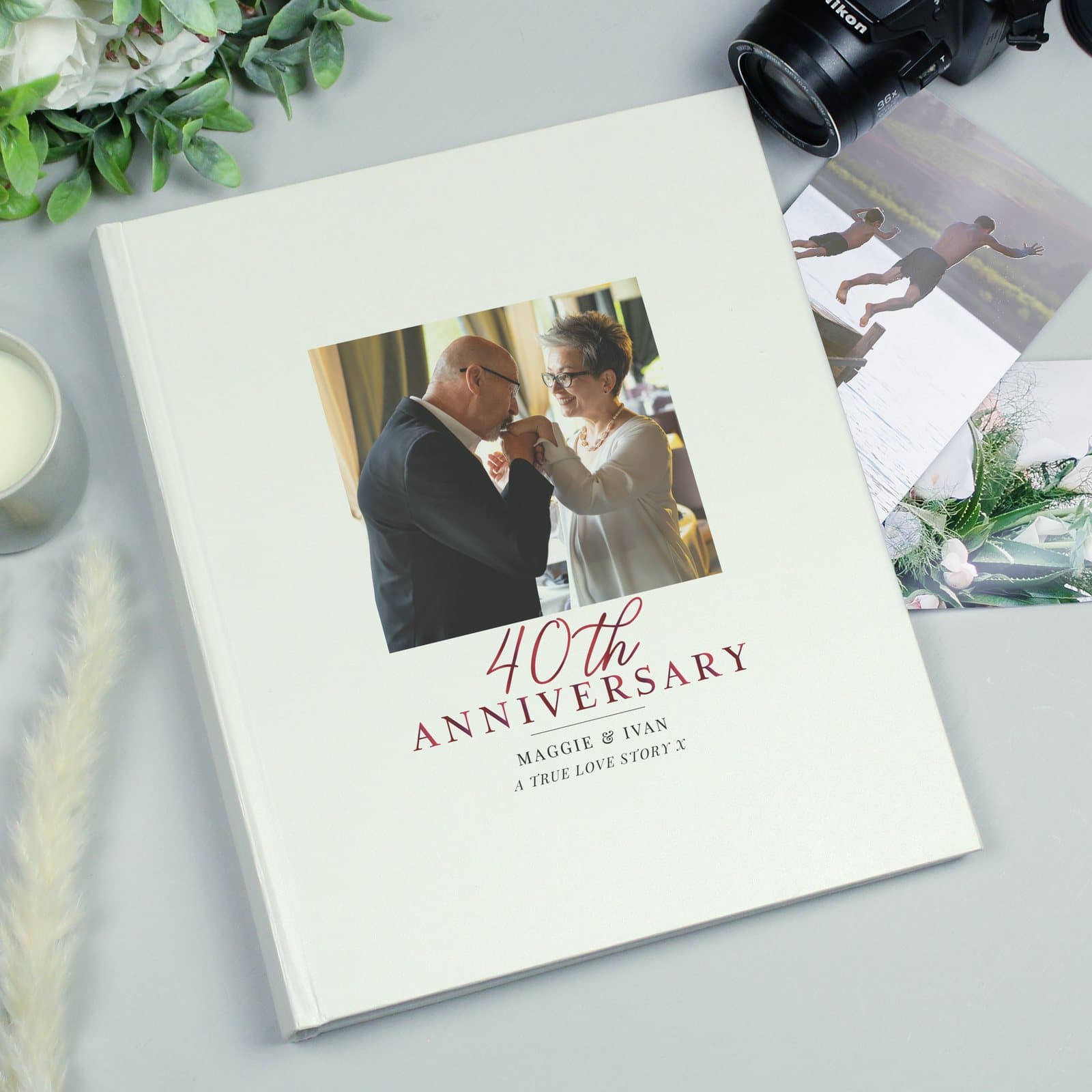 40th anniversary photo album with a photo on the cover