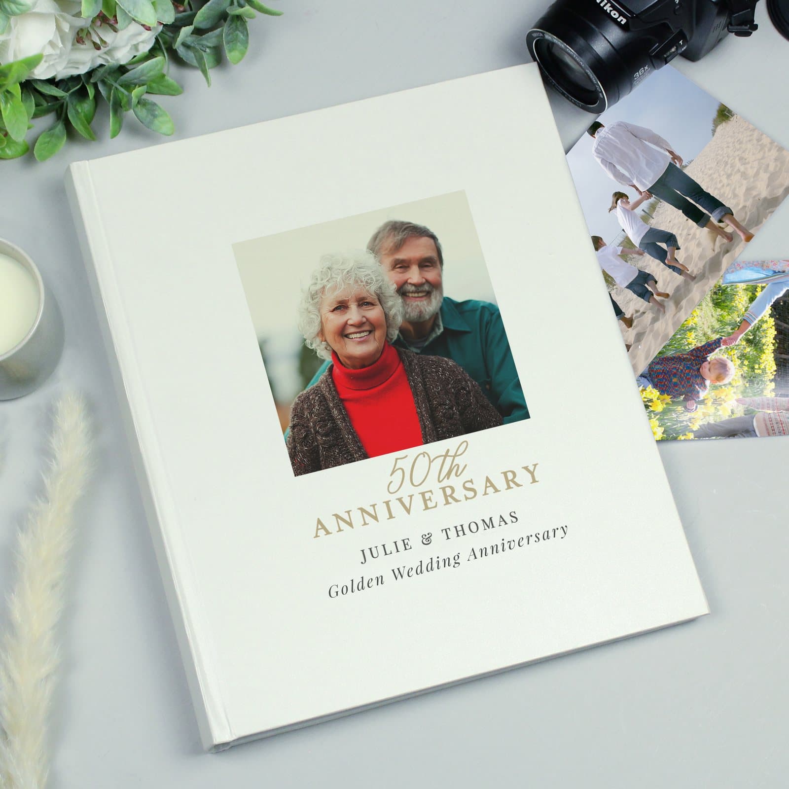 50th anniversary photo album with a photo on the cover