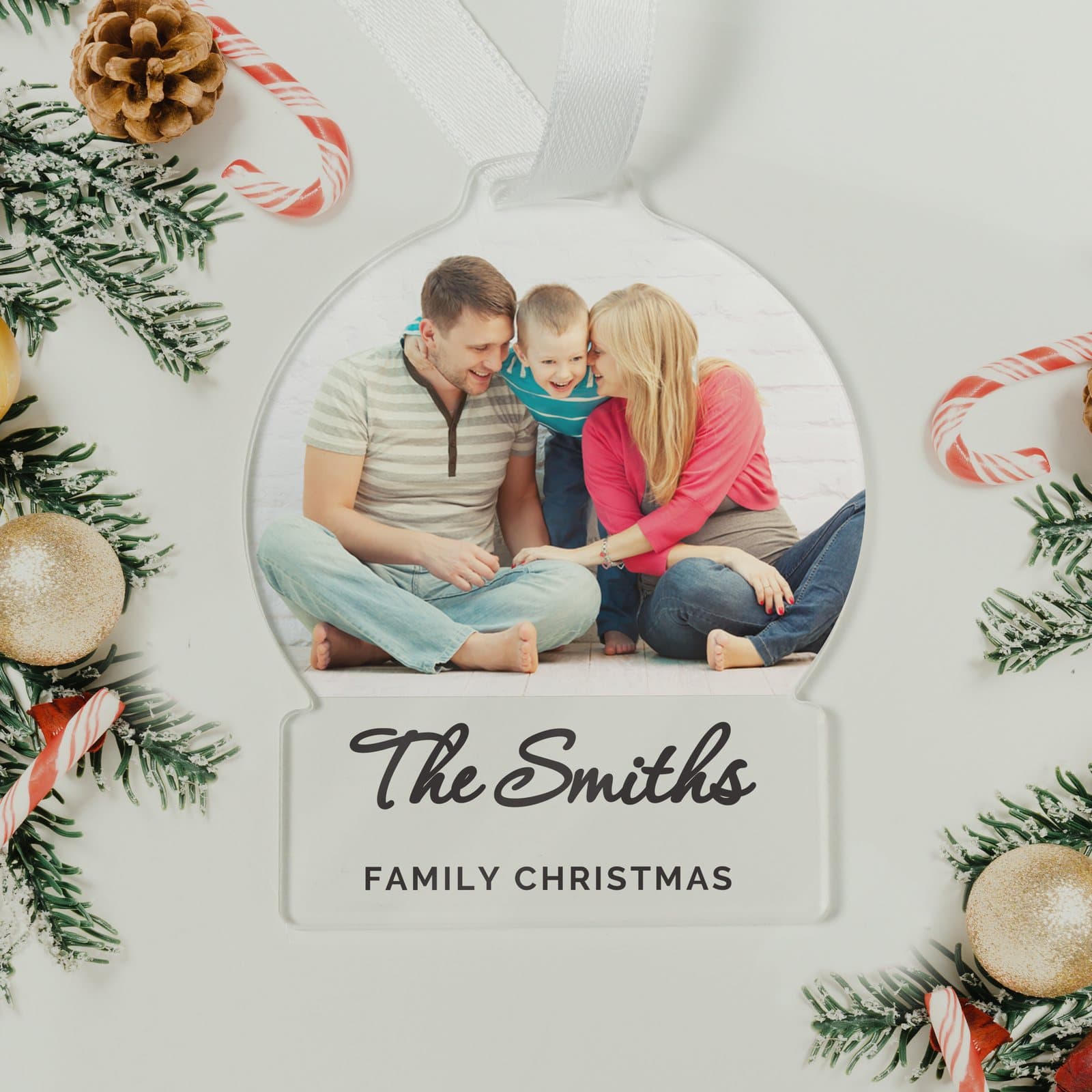 Acrylic Christmas tree decoration with a photo and two lines of text on a ribbon
