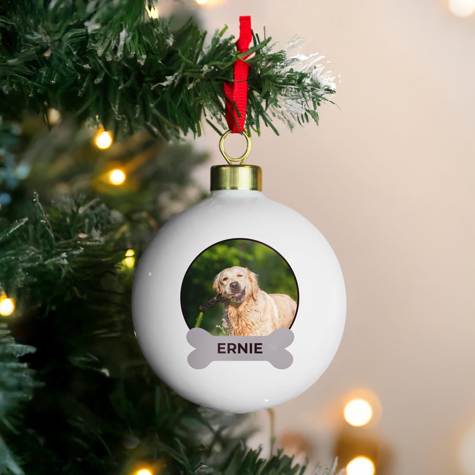 Dog Christmas bauble with a pet photo and a ribbon for hanging