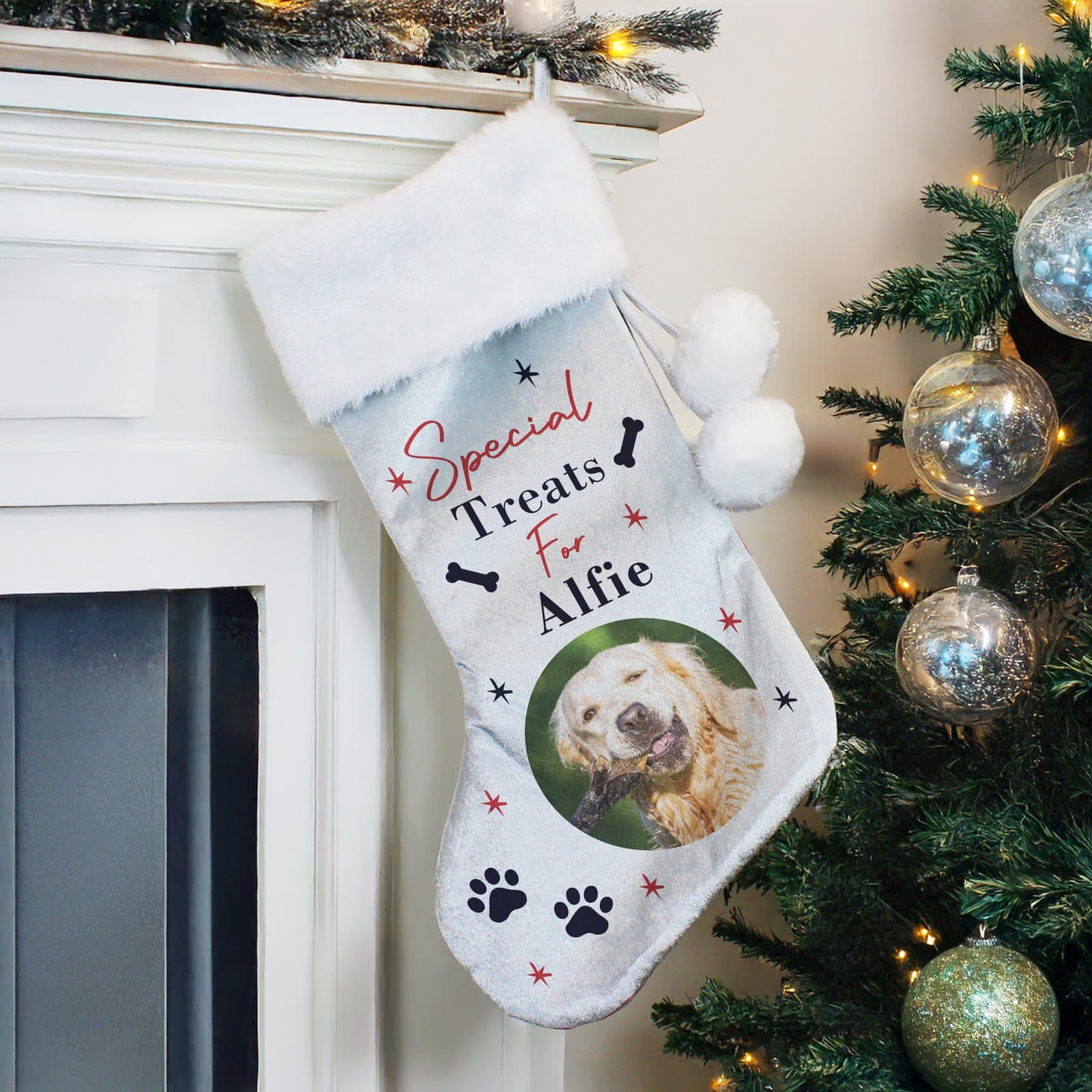 Velvet dog Christmas stocking with a plush white cuff and a hoop at the top