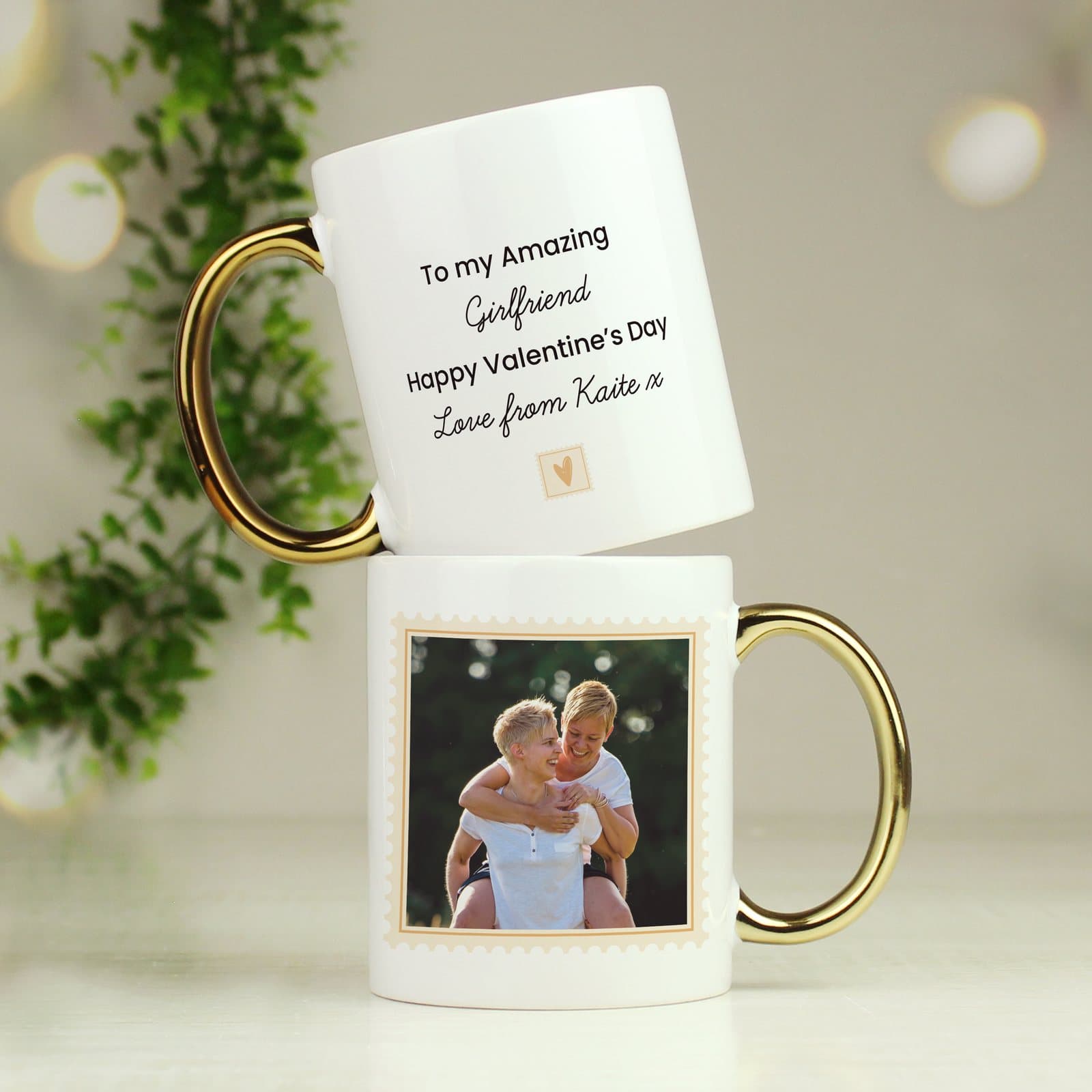 Ceramic mug with a gold handle and a photo on the front