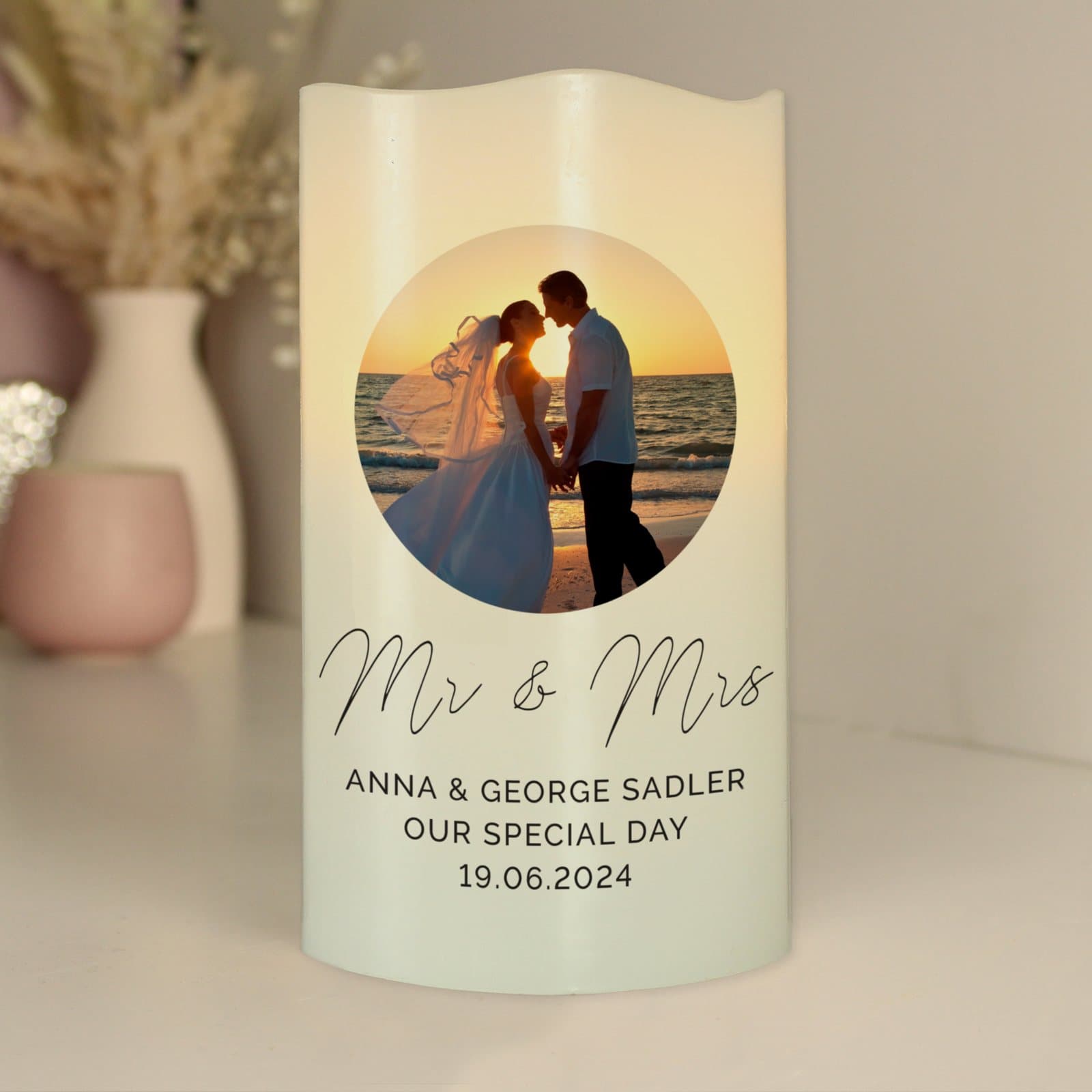 LED candle with a photo, script name and lines of personalised text