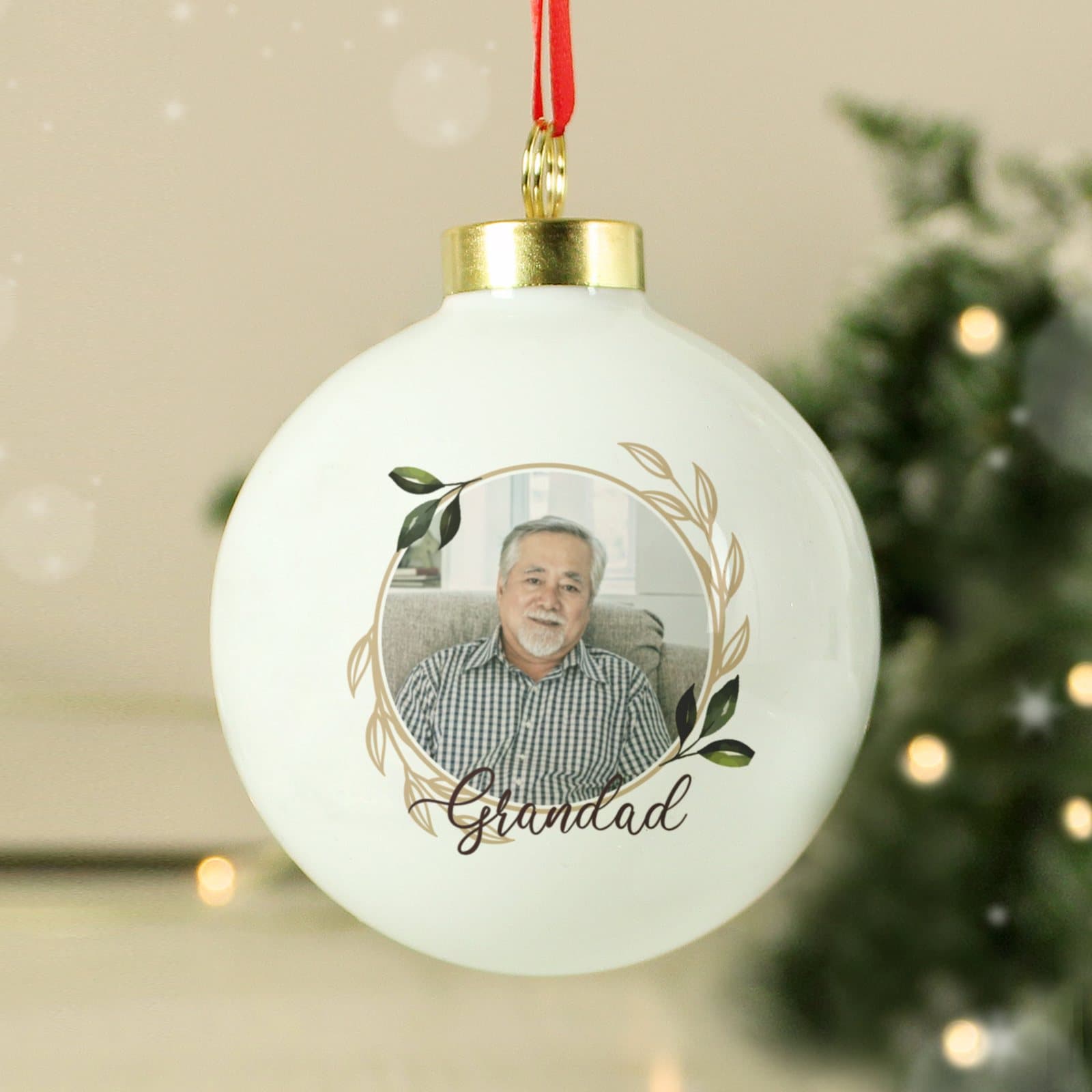Memorial Christmas bauble with a photo, name and ribbon