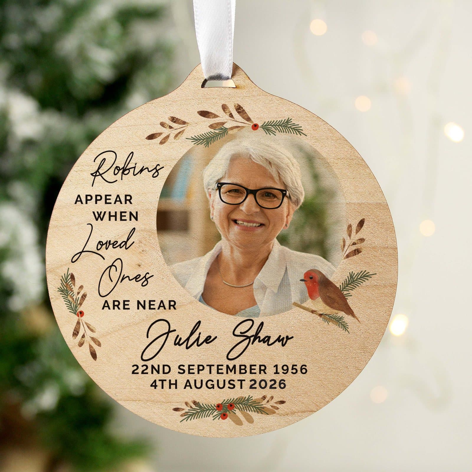 Round wooden bauble with a robin memorial message and photo