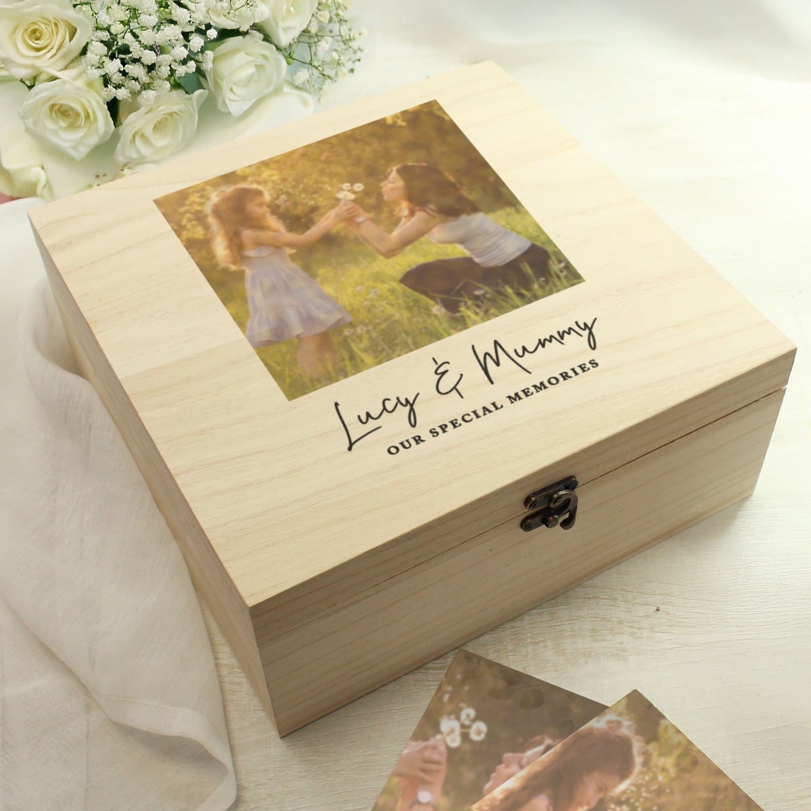 Wooden keepsake box with a photo and two lines of text on the lid