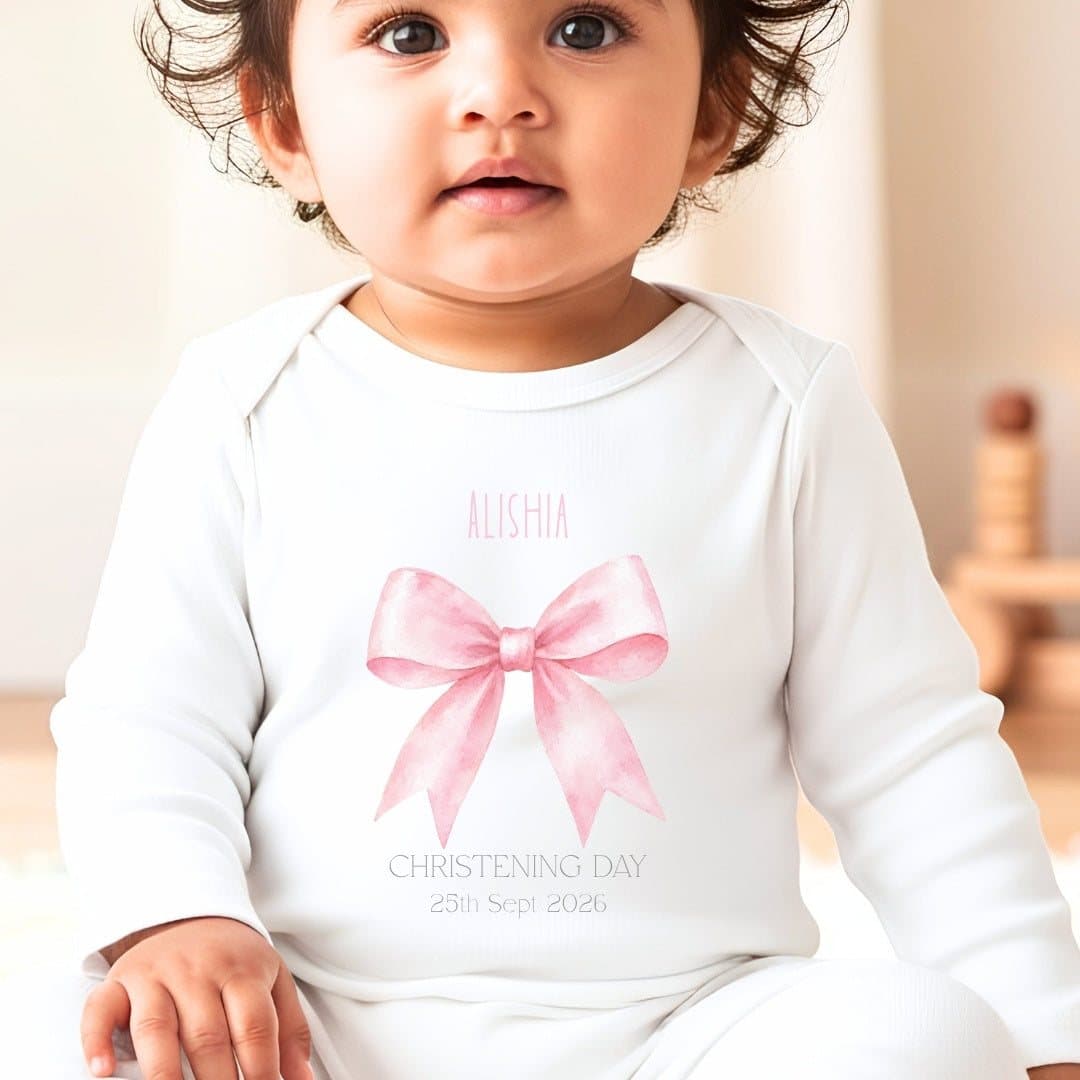 Pink bow christening baby grow, vest or bib with a name