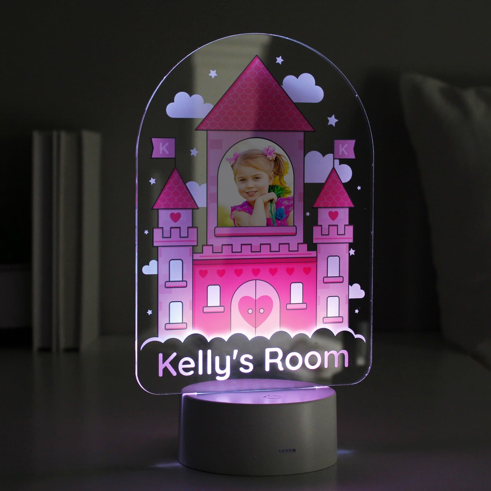 Pink castle LED night light with a photo and name on an acrylic sign