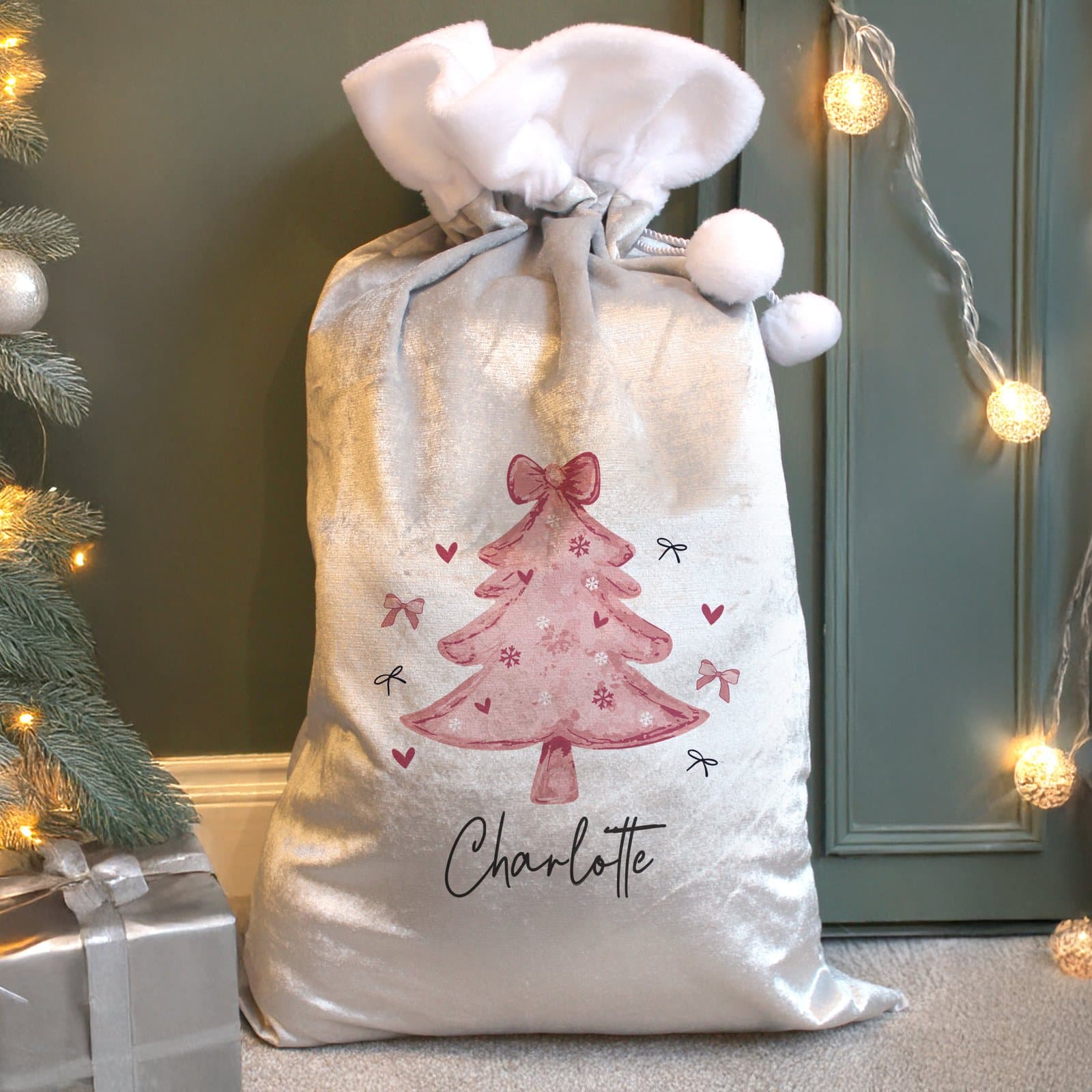 Pink Christmas sack with bows design and plush white cuff