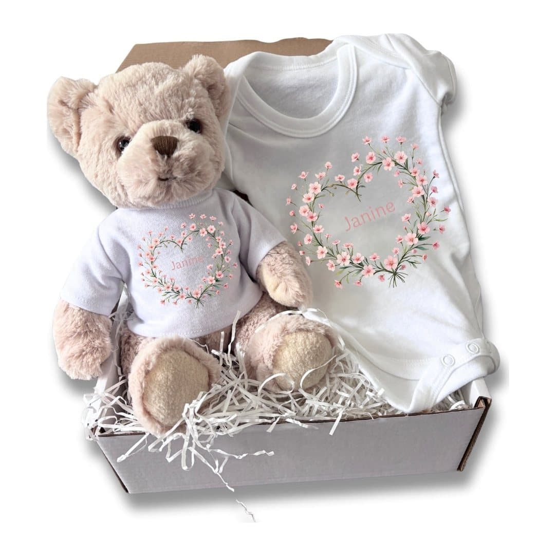 Personalised pink flower heart baby gift box with a teddy and baby vest