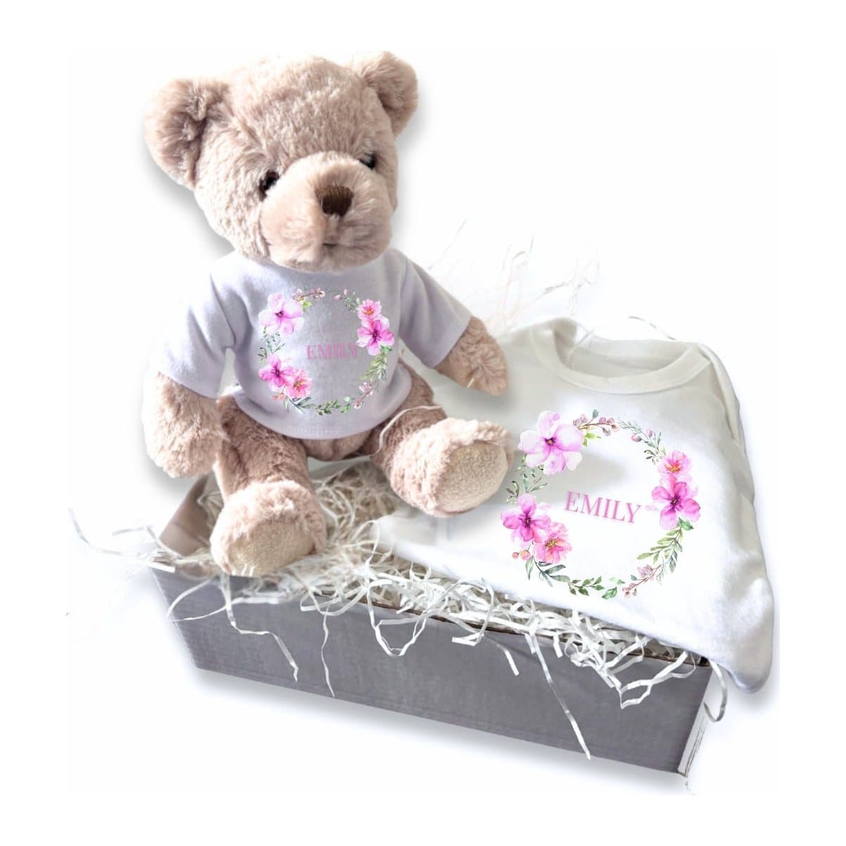 Pink flower wreath design on a baby vest and teddy, with a personalised name