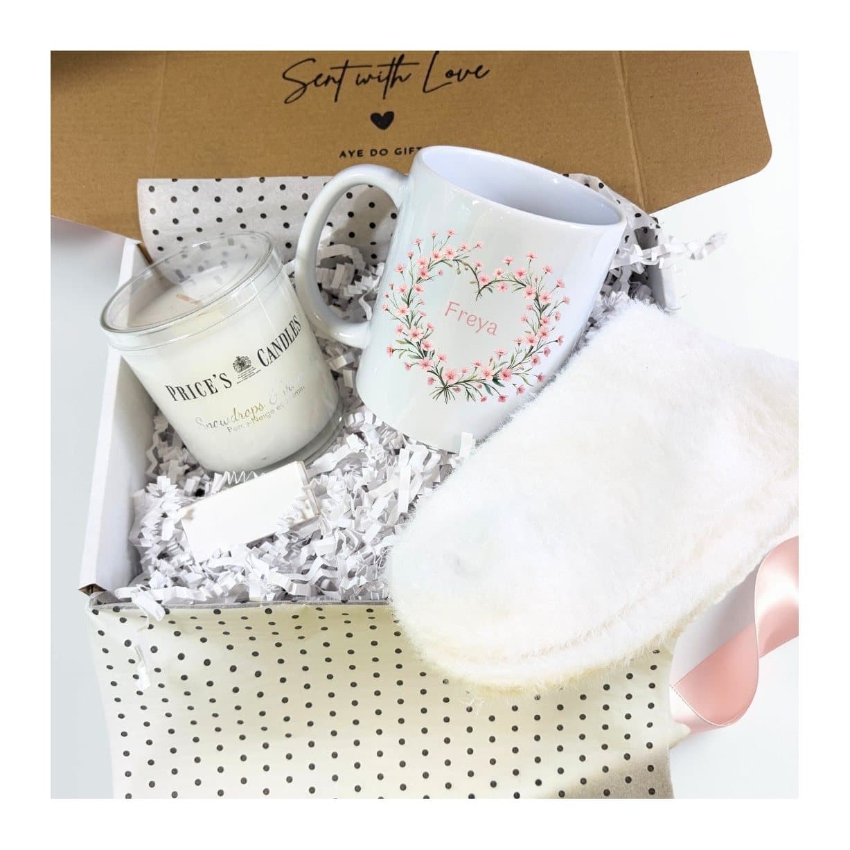 Personalised pink flower mug with a scented candle, fluffy socks and matches