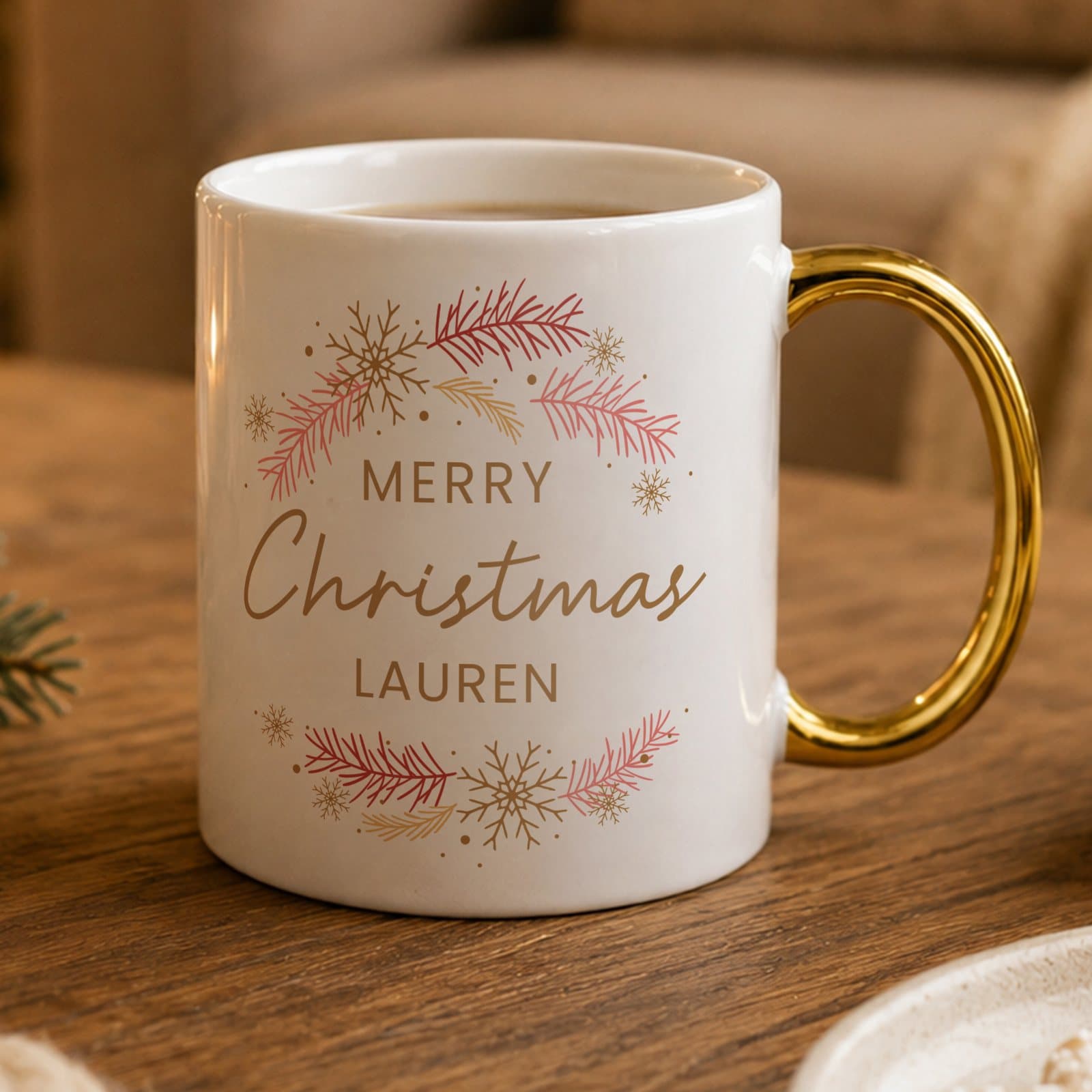 Pink and gold wreath Christmas mug with a gold handle
