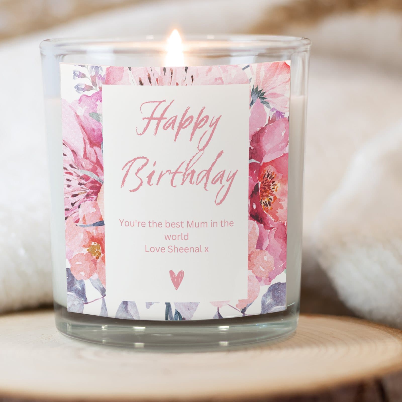 Pink personalised birthday candle set with Happy Birthday wording and a flower design