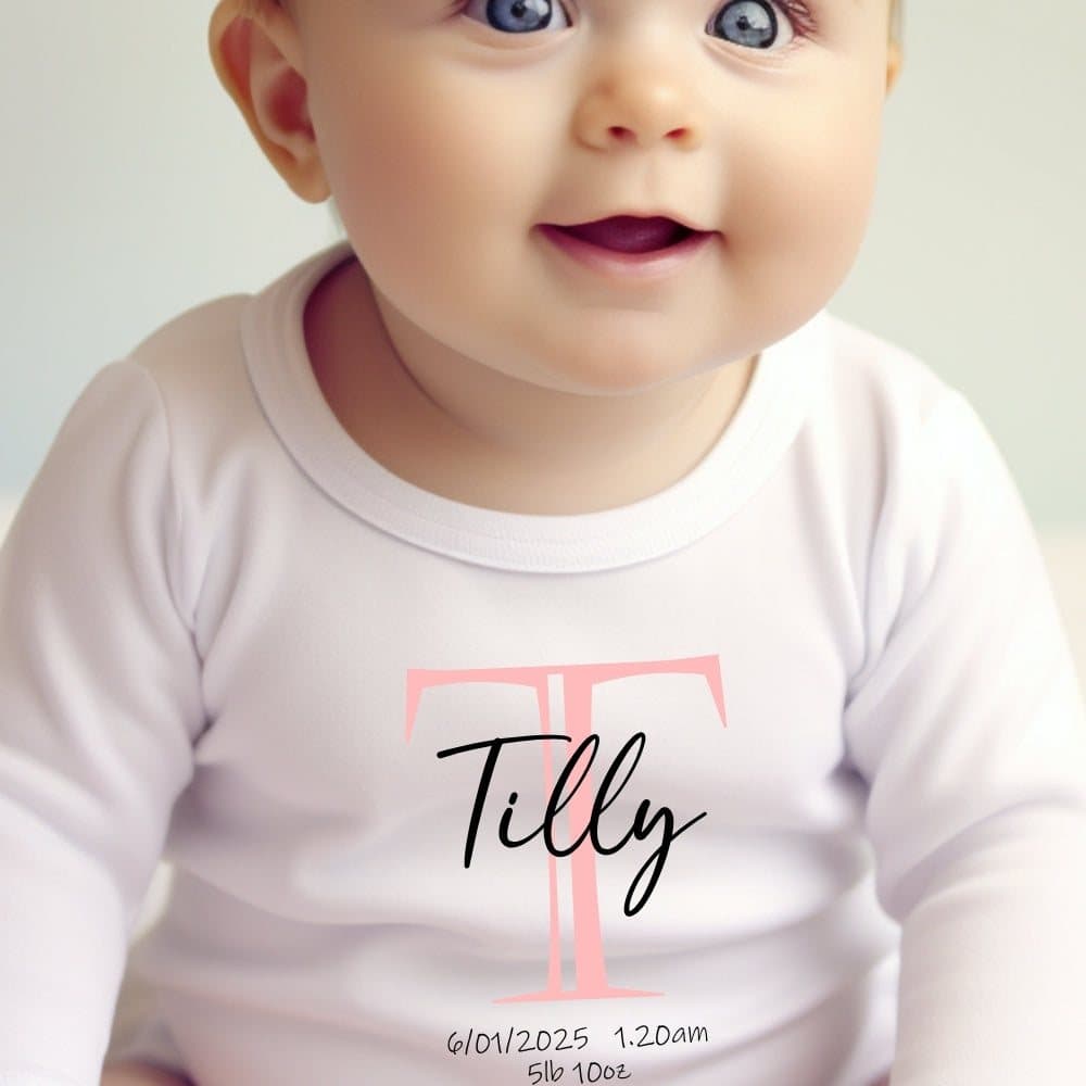 Pink initial baby grow, vest or bib with a name