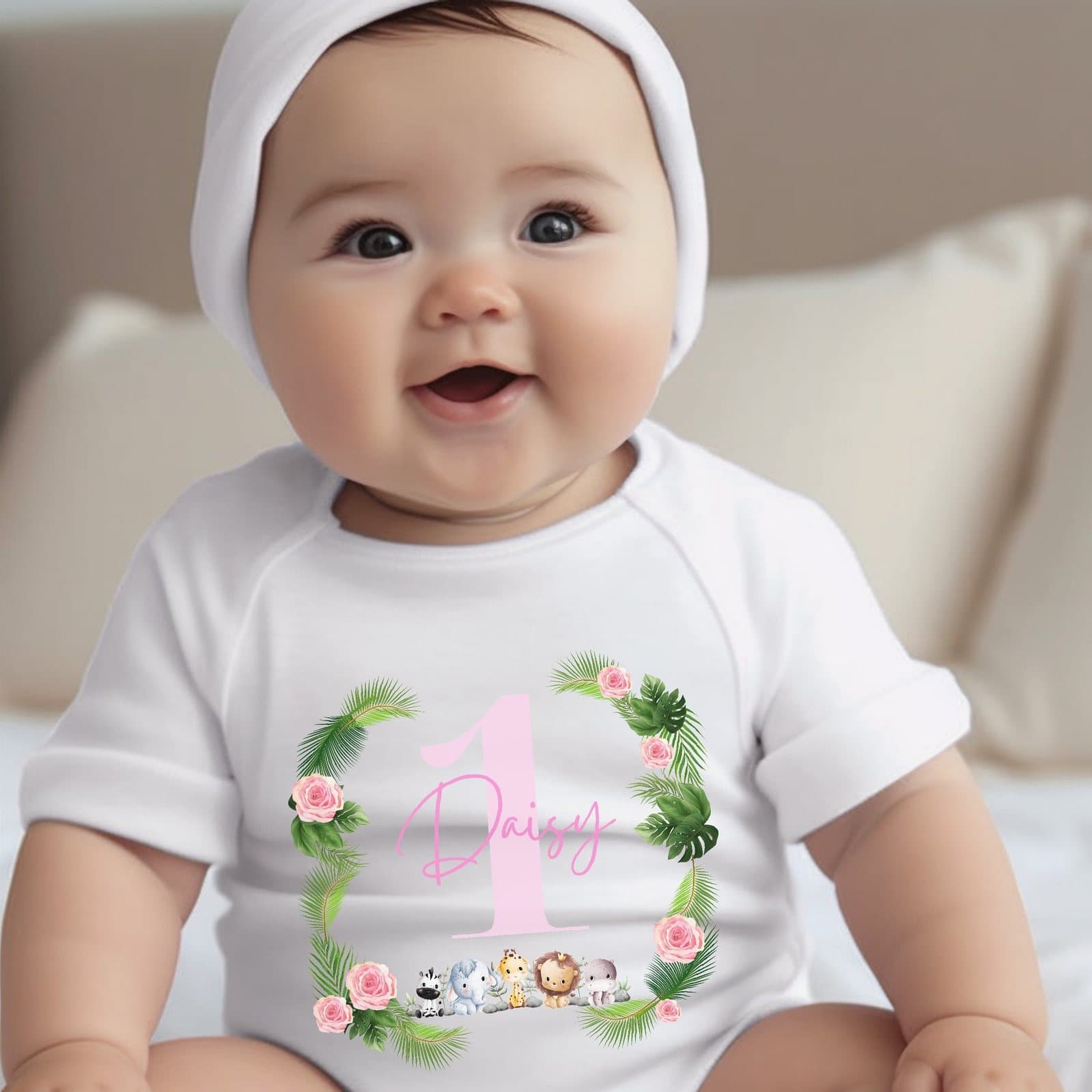 Pink personalised baby outfit with a safari animals design