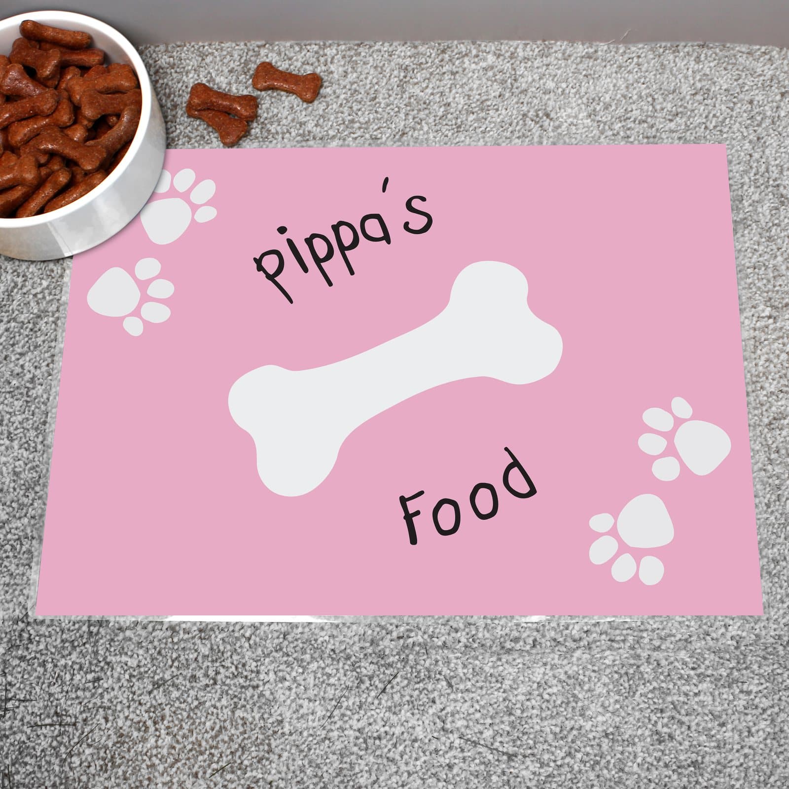 Pink paw print dog placemat, fully laminated, with a pet's name and the word Food