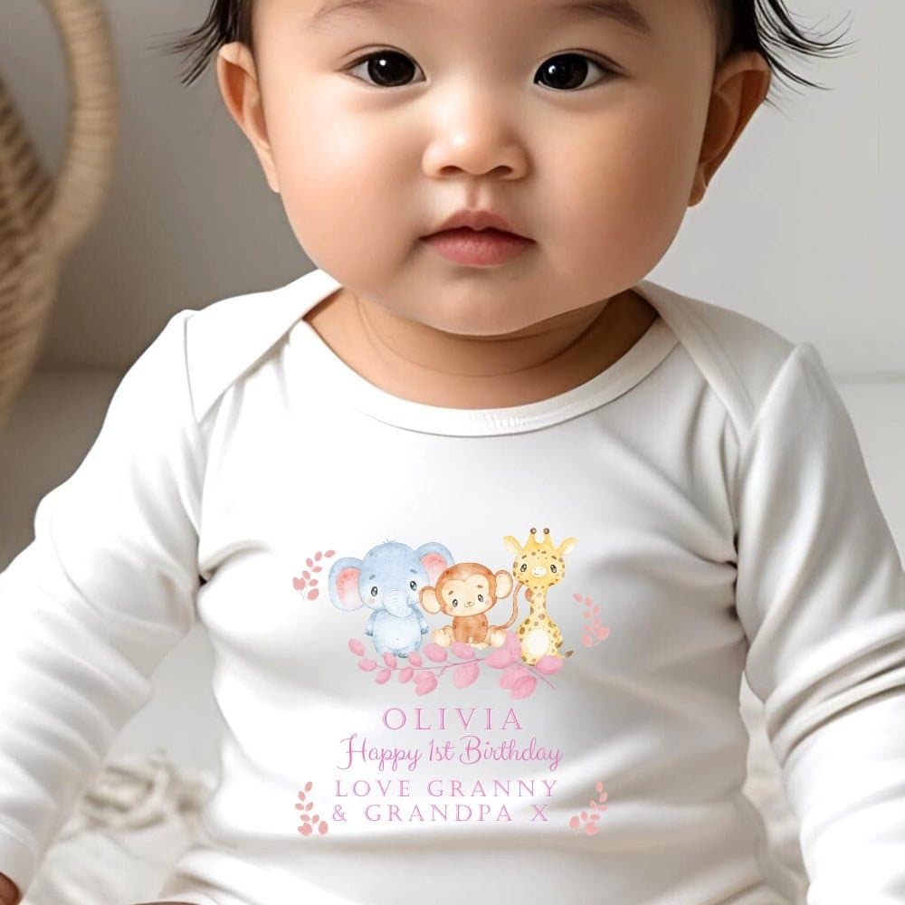 Pink personalised baby outfit with a safari animals design and a name