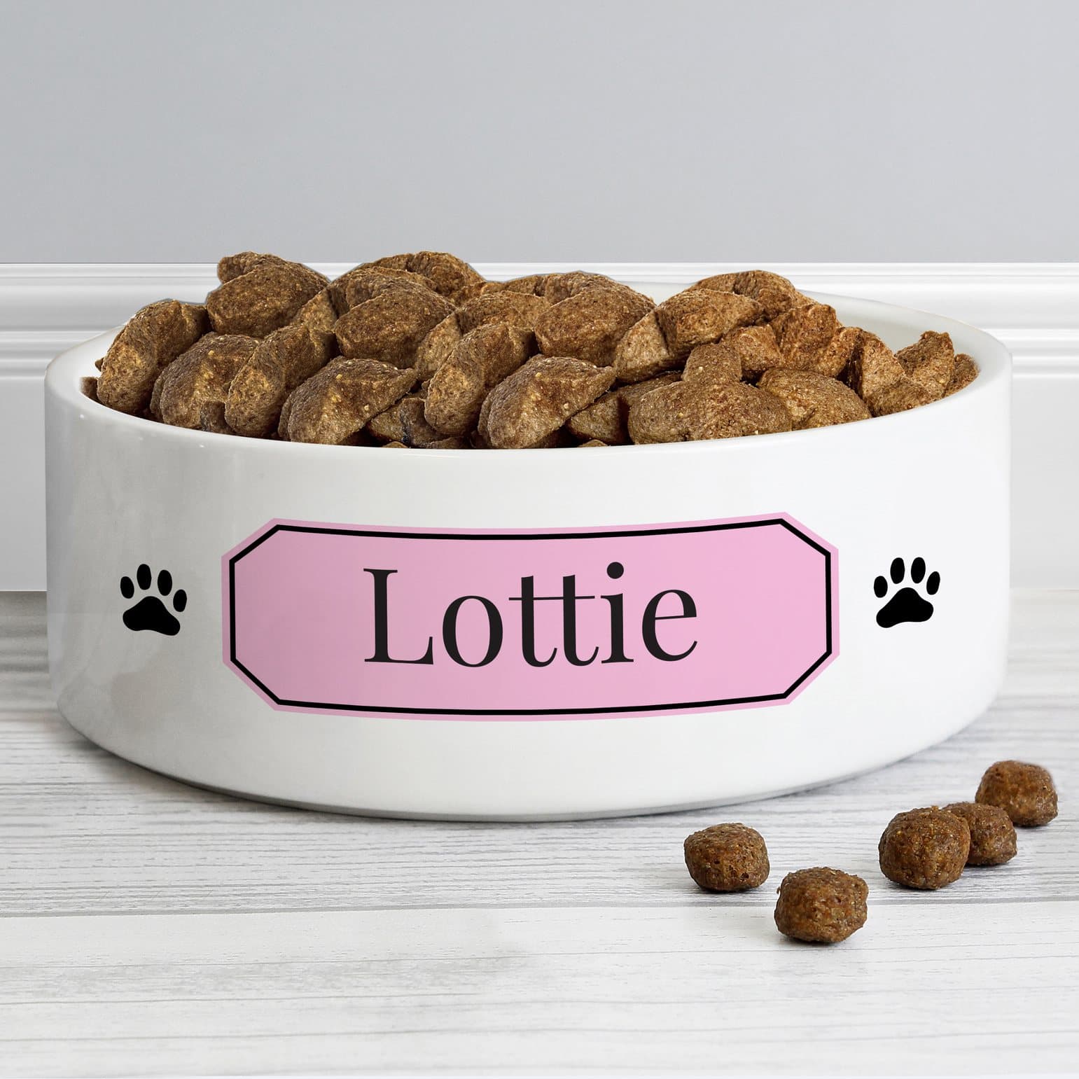 Personalised ceramic pet bowl in pink or blue