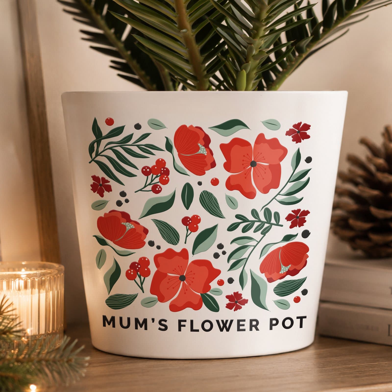 Large ceramic poinsettia plant pot with personalised line