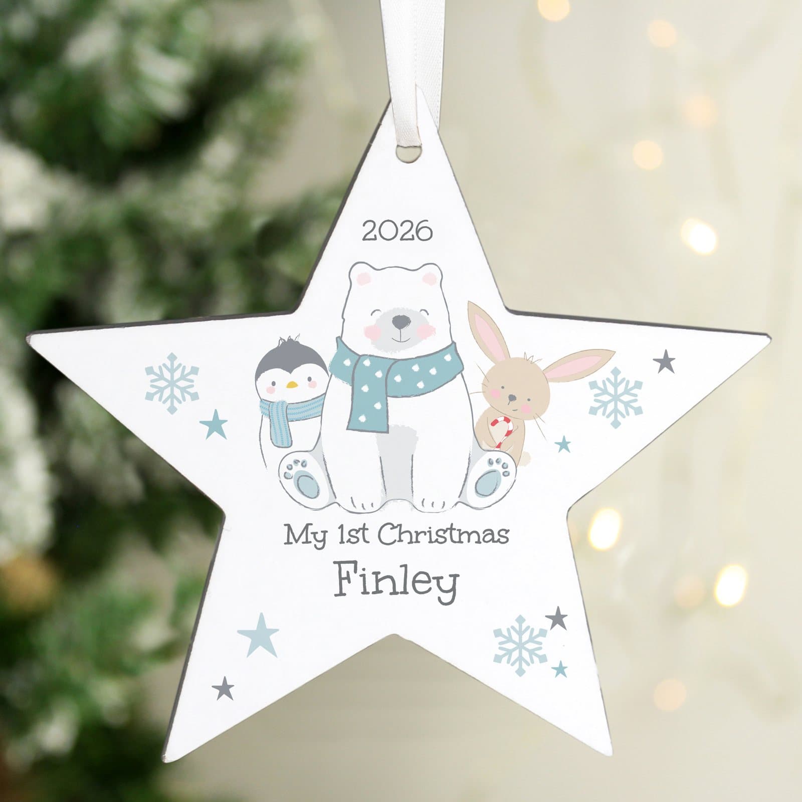 Wooden star ornament with a polar bear design and personalised text, ribbon included