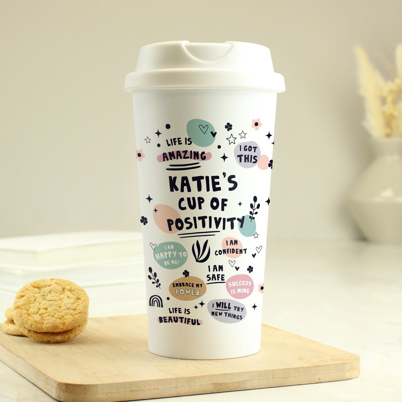 Plastic travel mug with screw-on lid reading cup of positivity