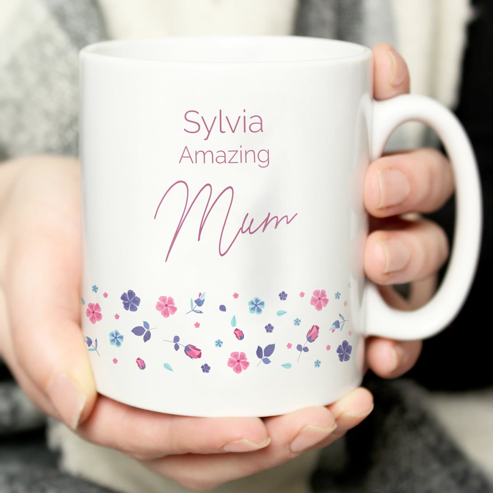 Floral ceramic mug with a personalised title and a name