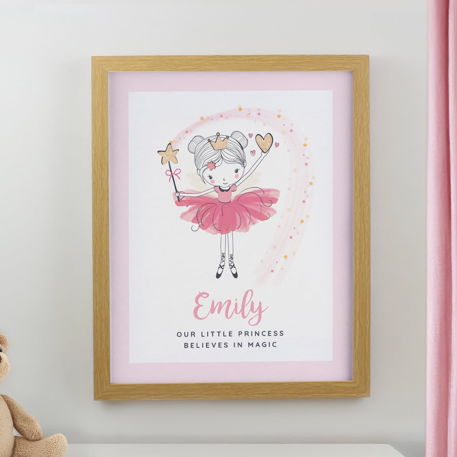 Ballerina framed print in a large oak poster frame