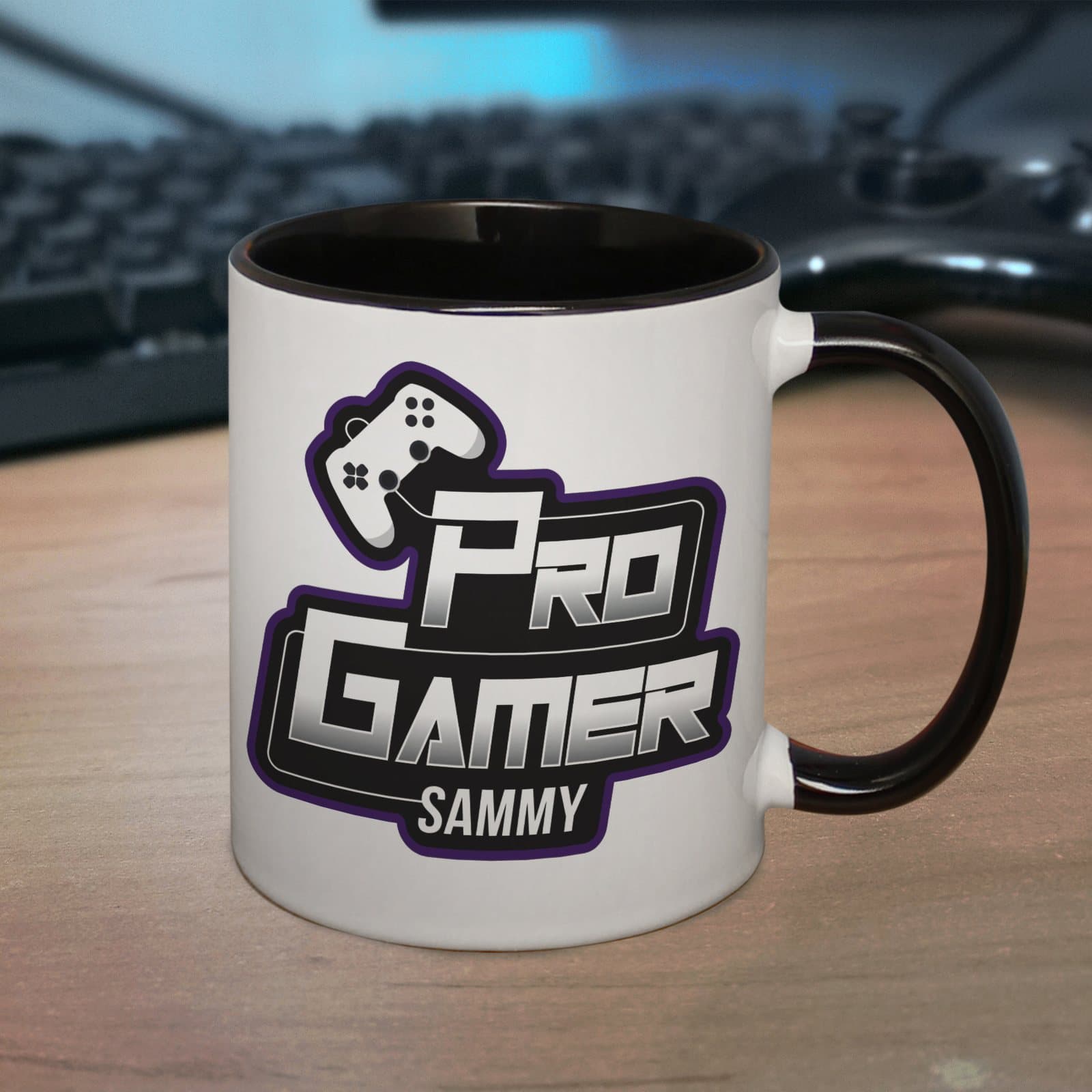 Black handled ceramic mug with a controller and Pro Gamer text