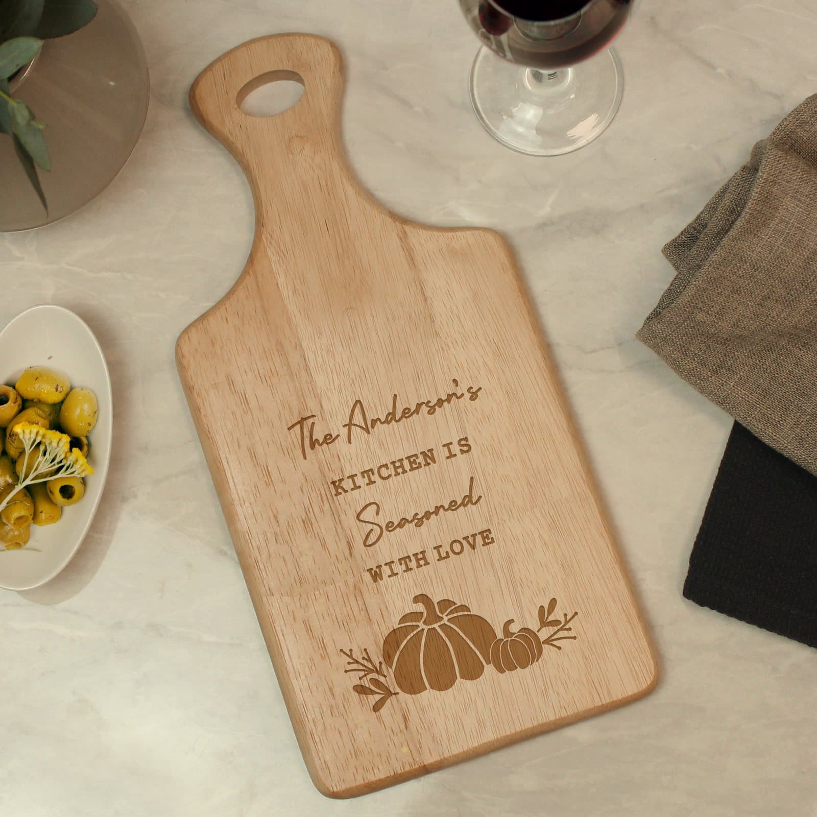 Pumpkin paddle chopping board in natural wood with engraved personalised lines
