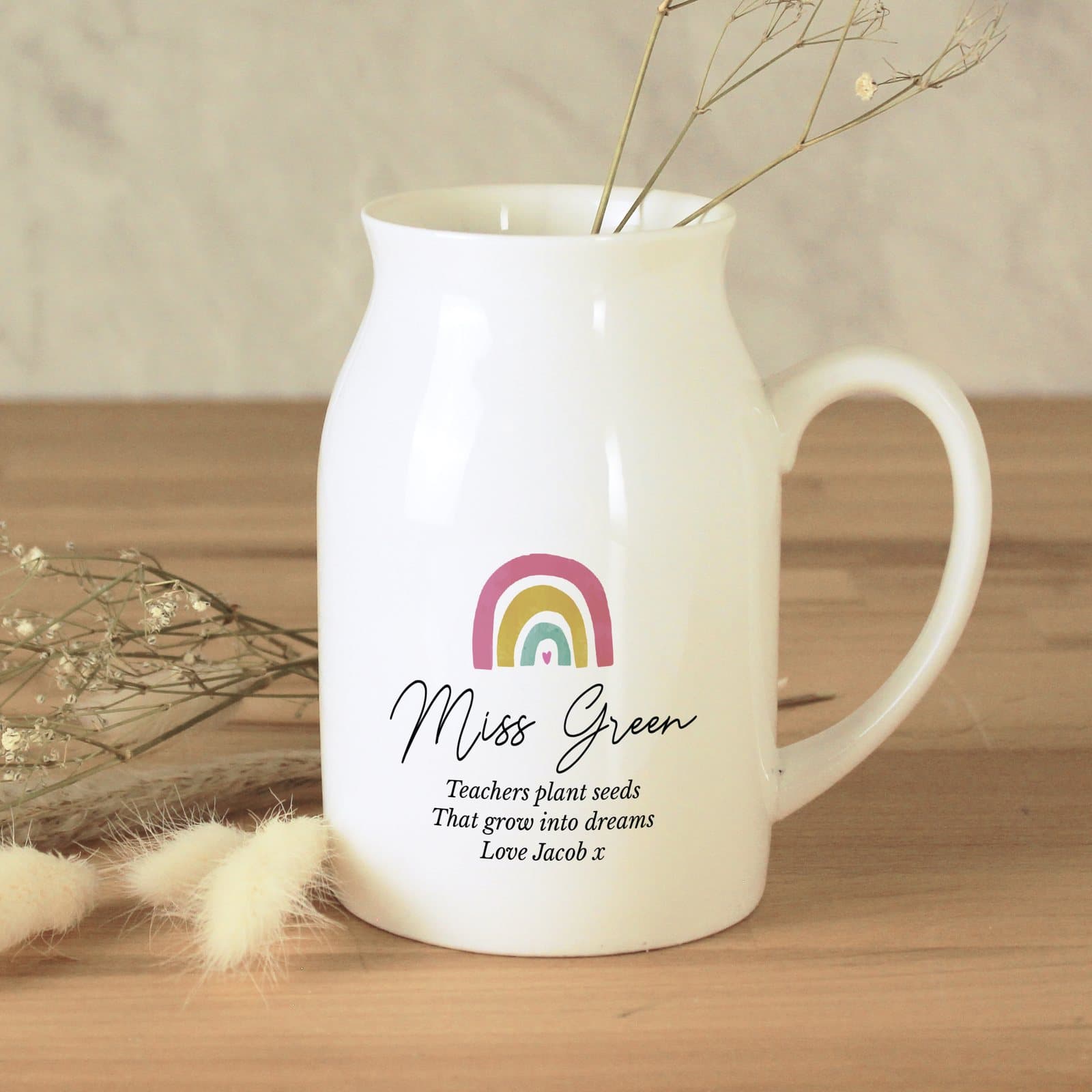 Ceramic rainbow flower jug vase with a personalised name and message