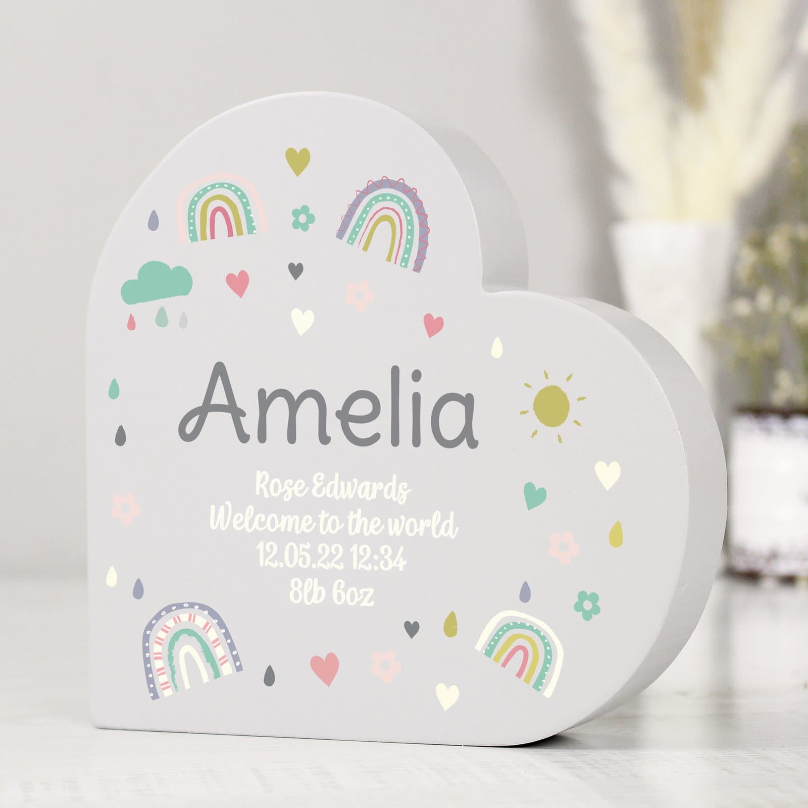 Free standing rainbow heart ornament in painted wood